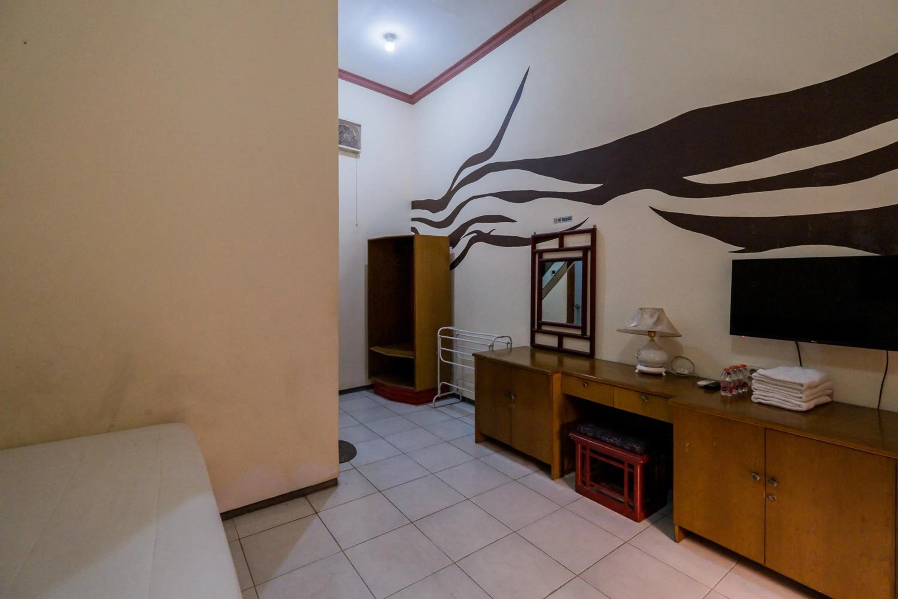 Bed in Palereman Hotel RedPartner near Jatim Park 1