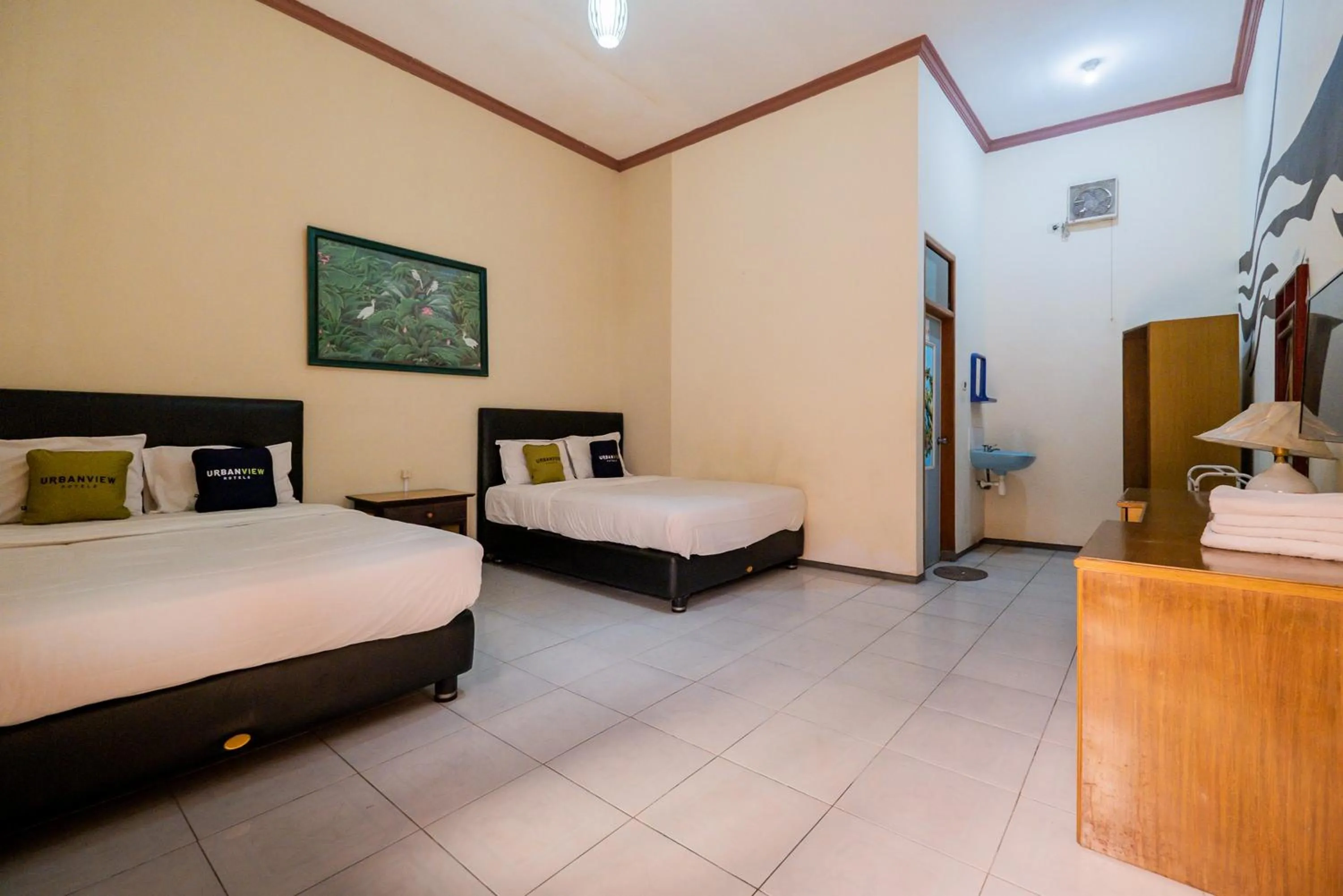 Bed in Palereman Hotel RedPartner near Jatim Park 1