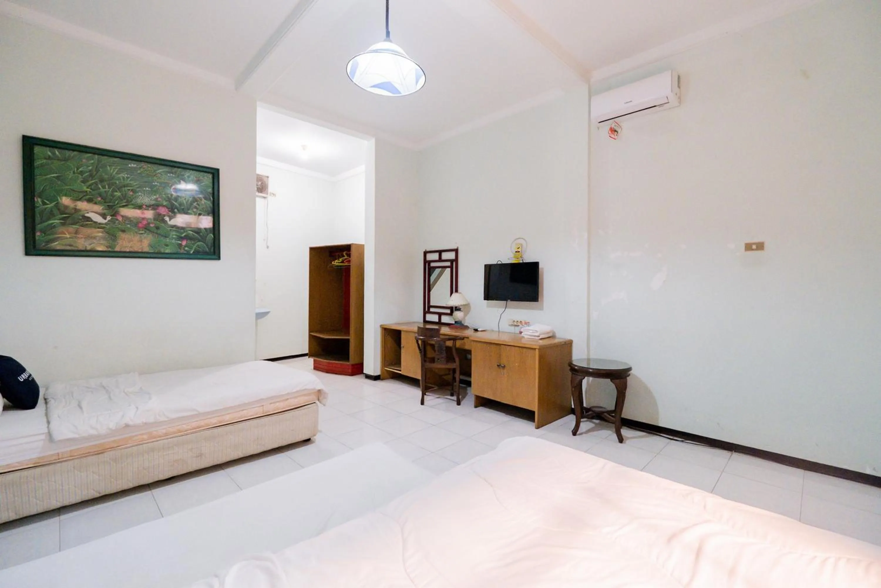 Bed in Palereman Hotel RedPartner near Jatim Park 1