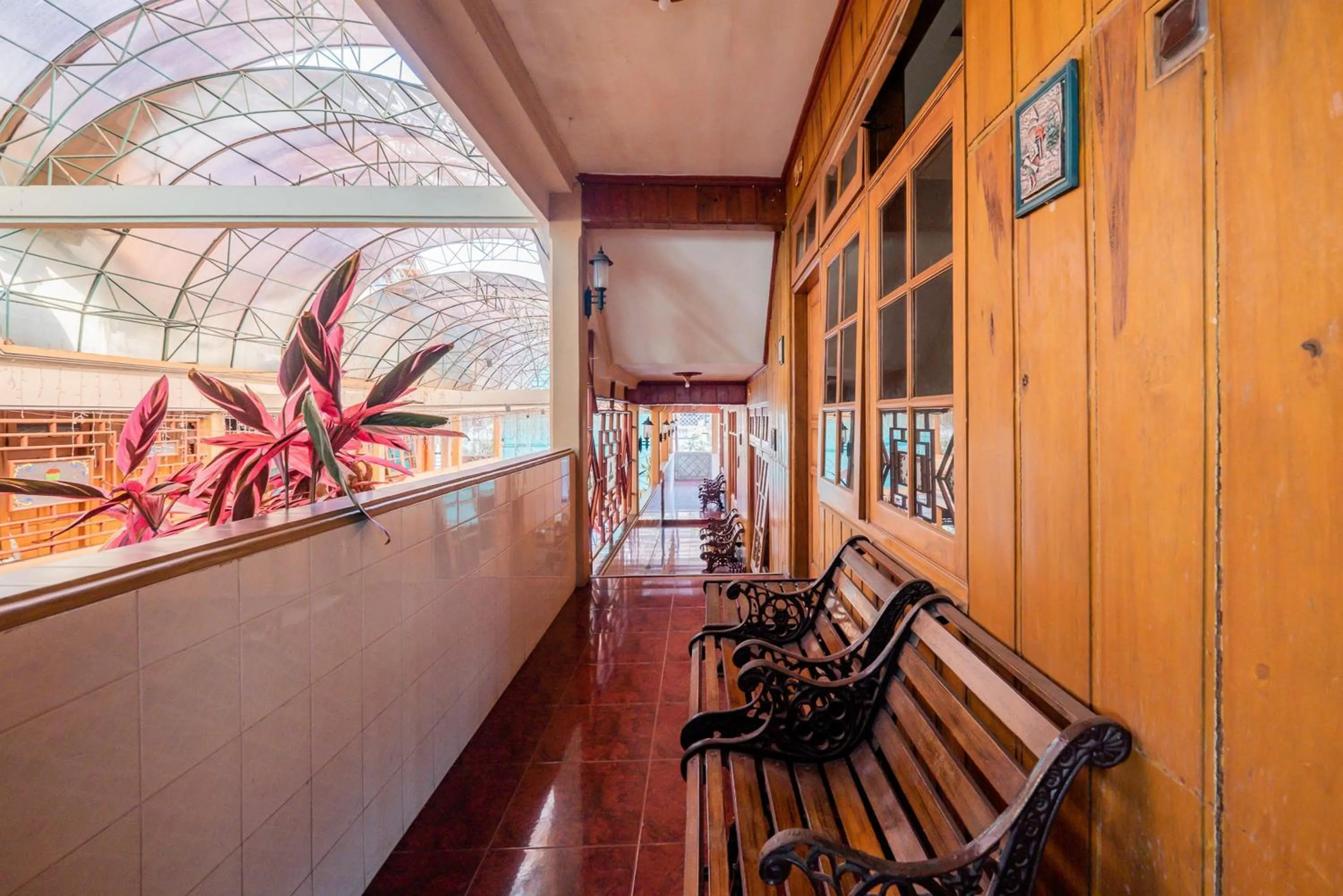 Seating area in Palereman Hotel RedPartner near Jatim Park 1