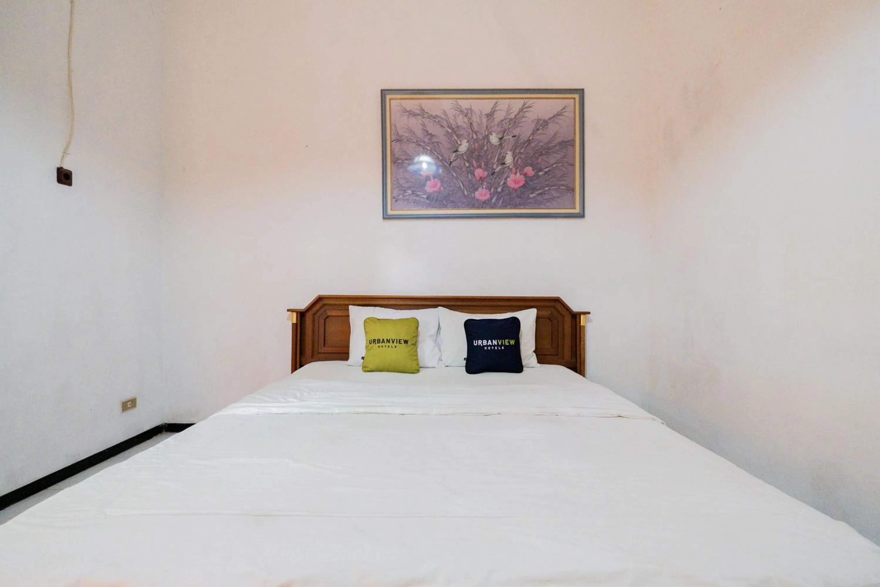Bed in Palereman Hotel RedPartner near Jatim Park 1