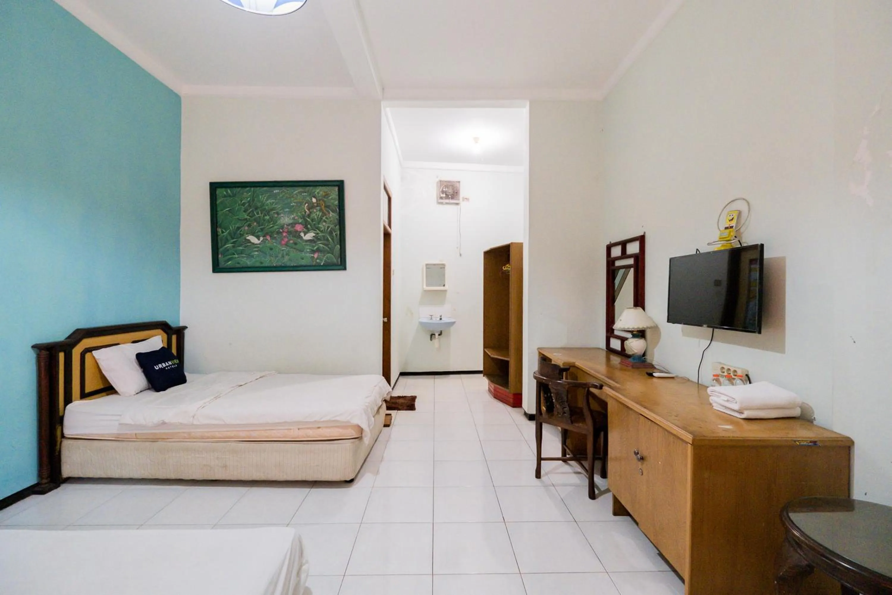 Bed in Palereman Hotel RedPartner near Jatim Park 1