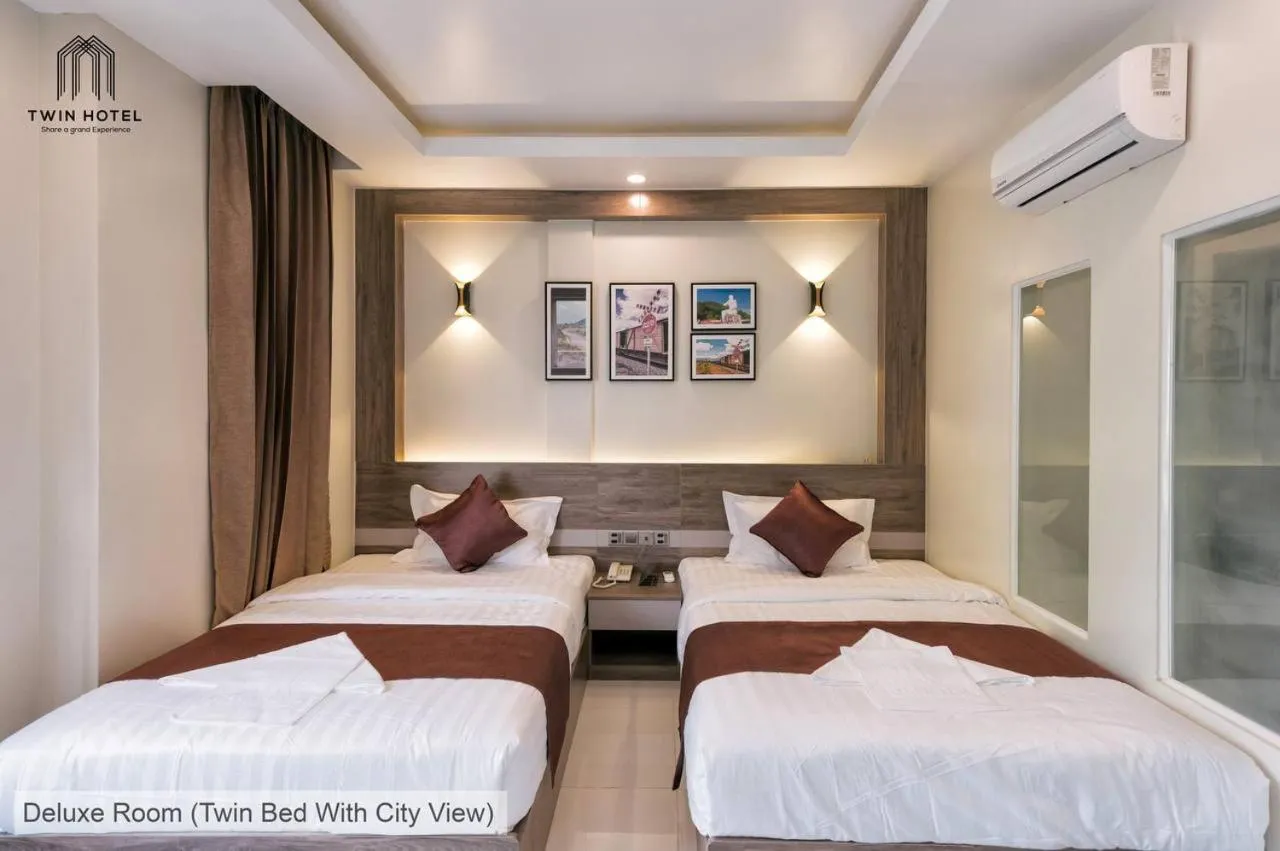 Bed in Twin Hotel Kampot