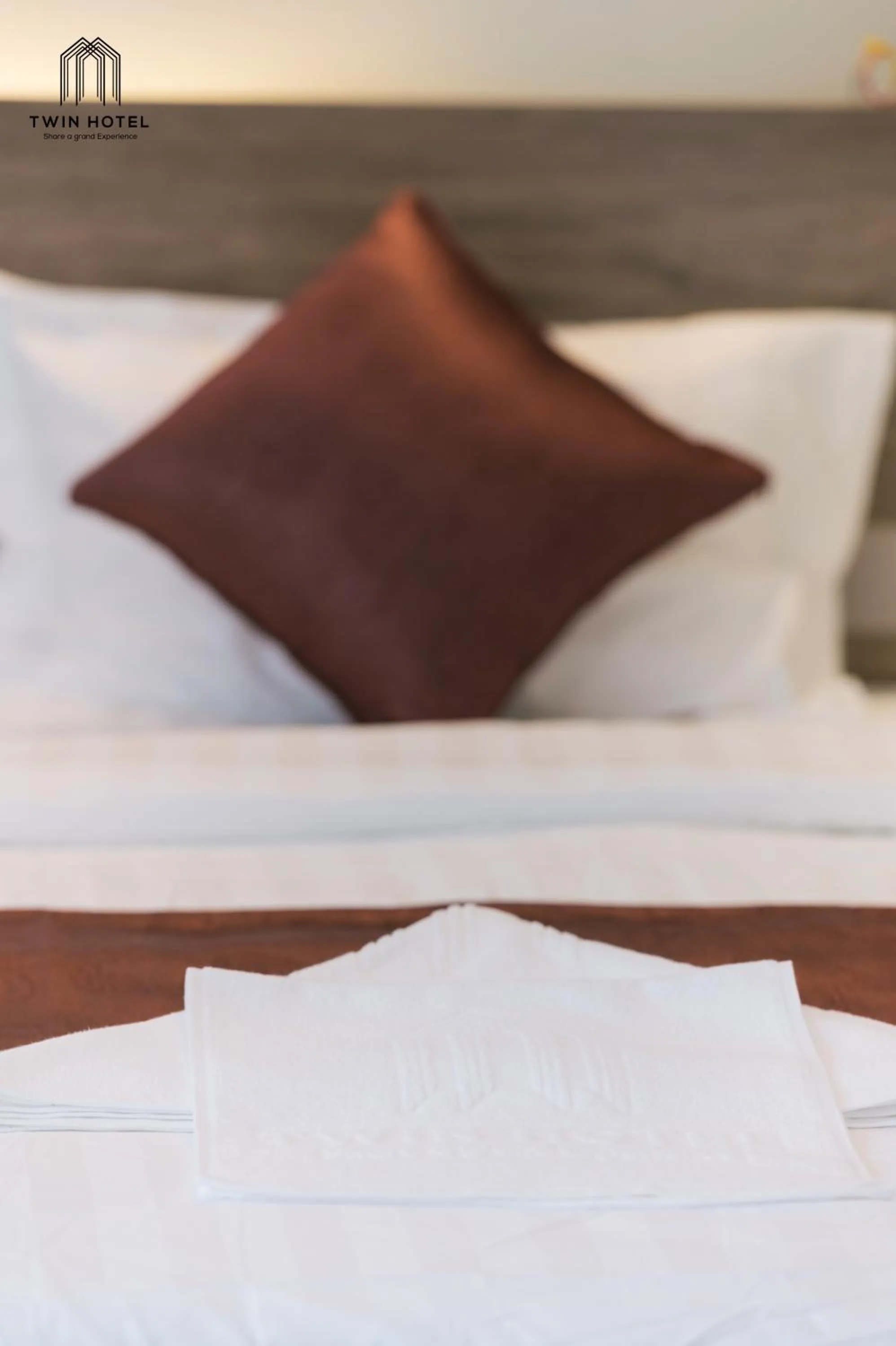 Bed in Twin Hotel Kampot