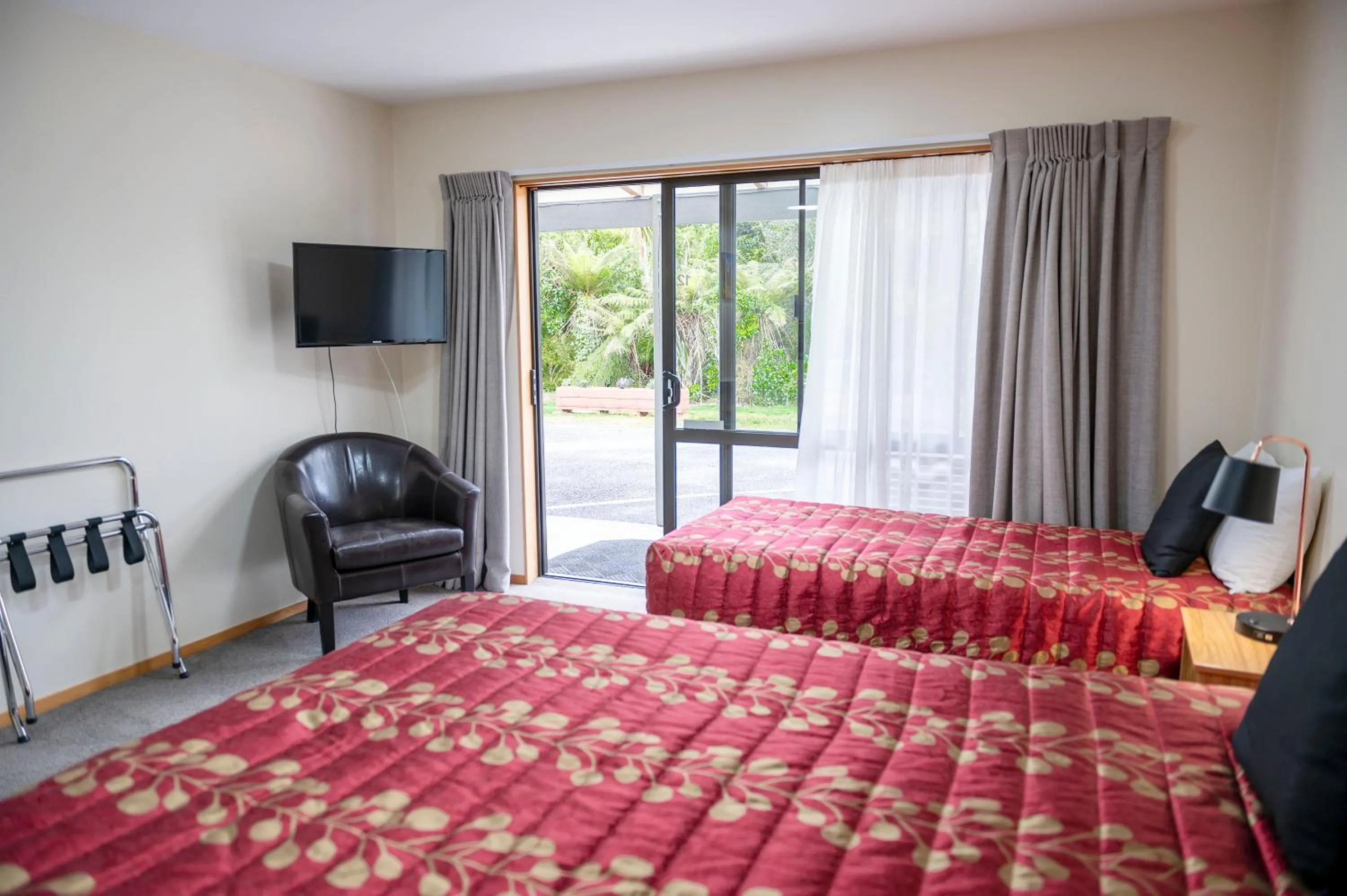 Bed in ASURE Aspiring Court Motel