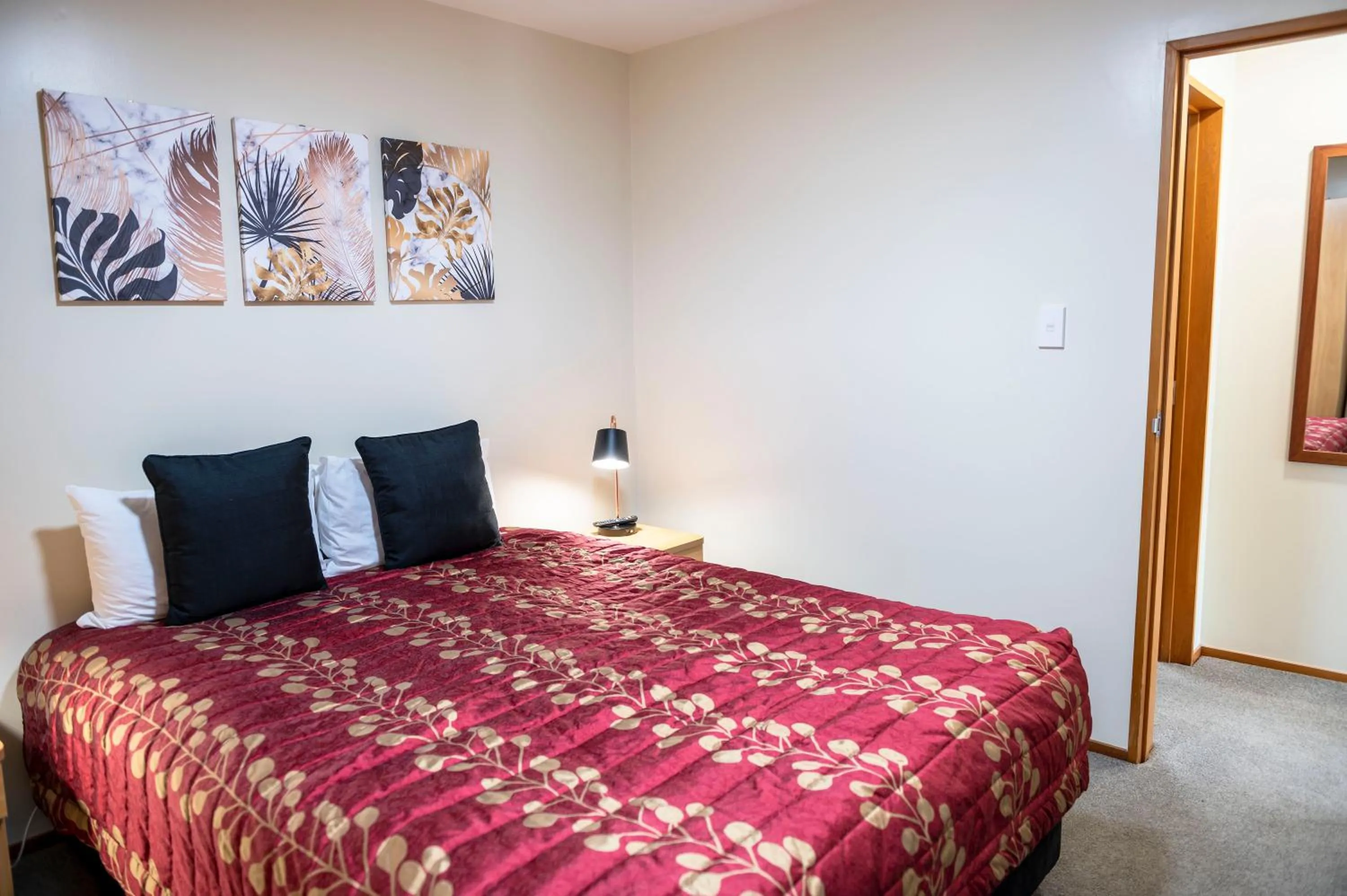 Bed in ASURE Aspiring Court Motel