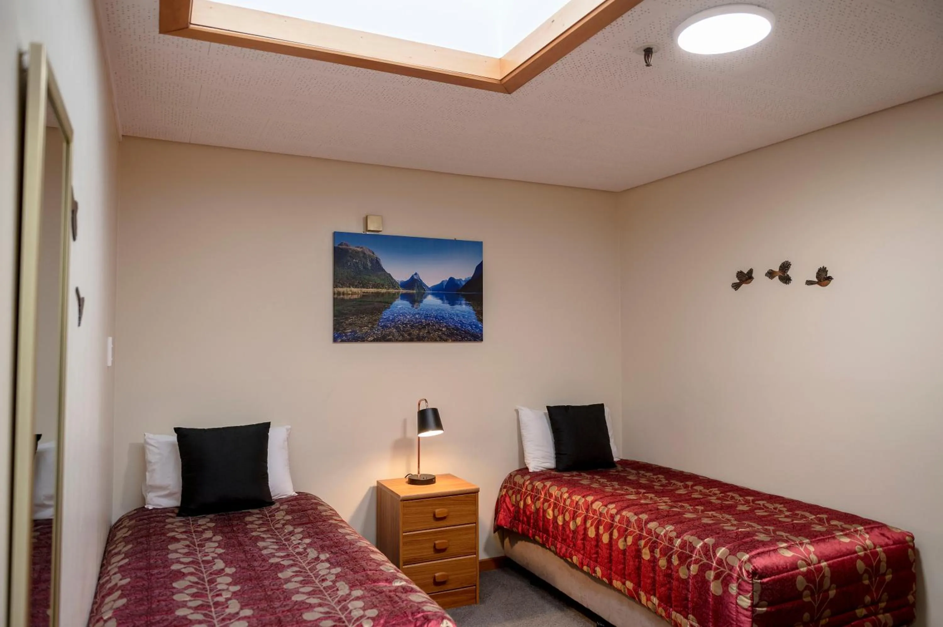 Bed in ASURE Aspiring Court Motel