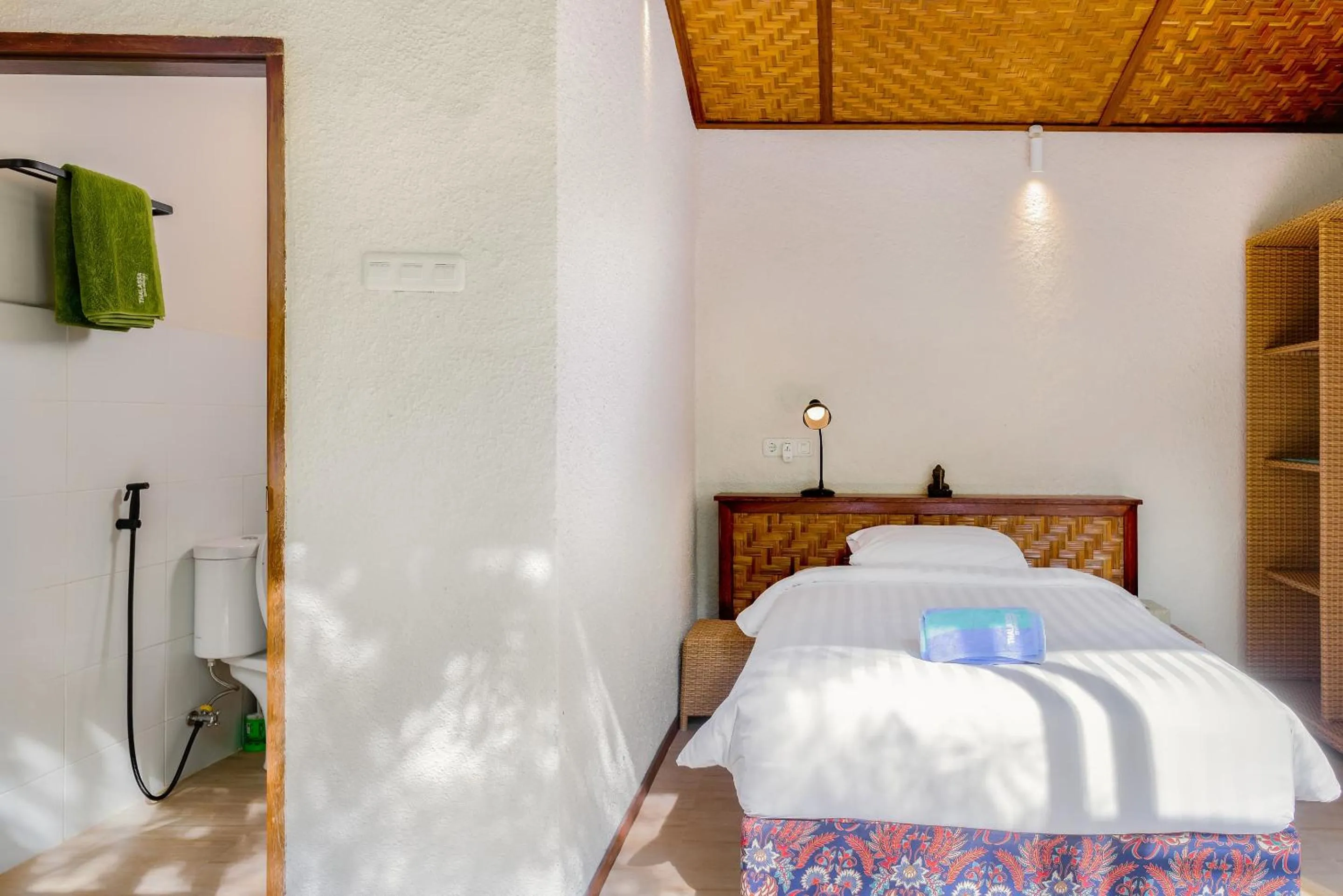 Bed in Thalassa Dive & Wellbeing Resort Manado