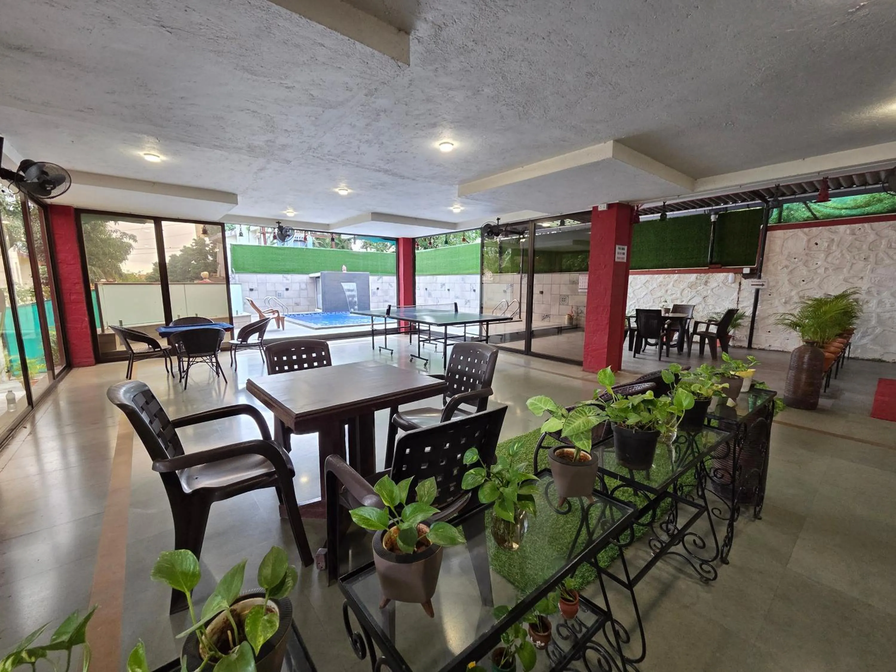 Communal lounge/ TV room in Girivihar Holiday Club - Pure Veg