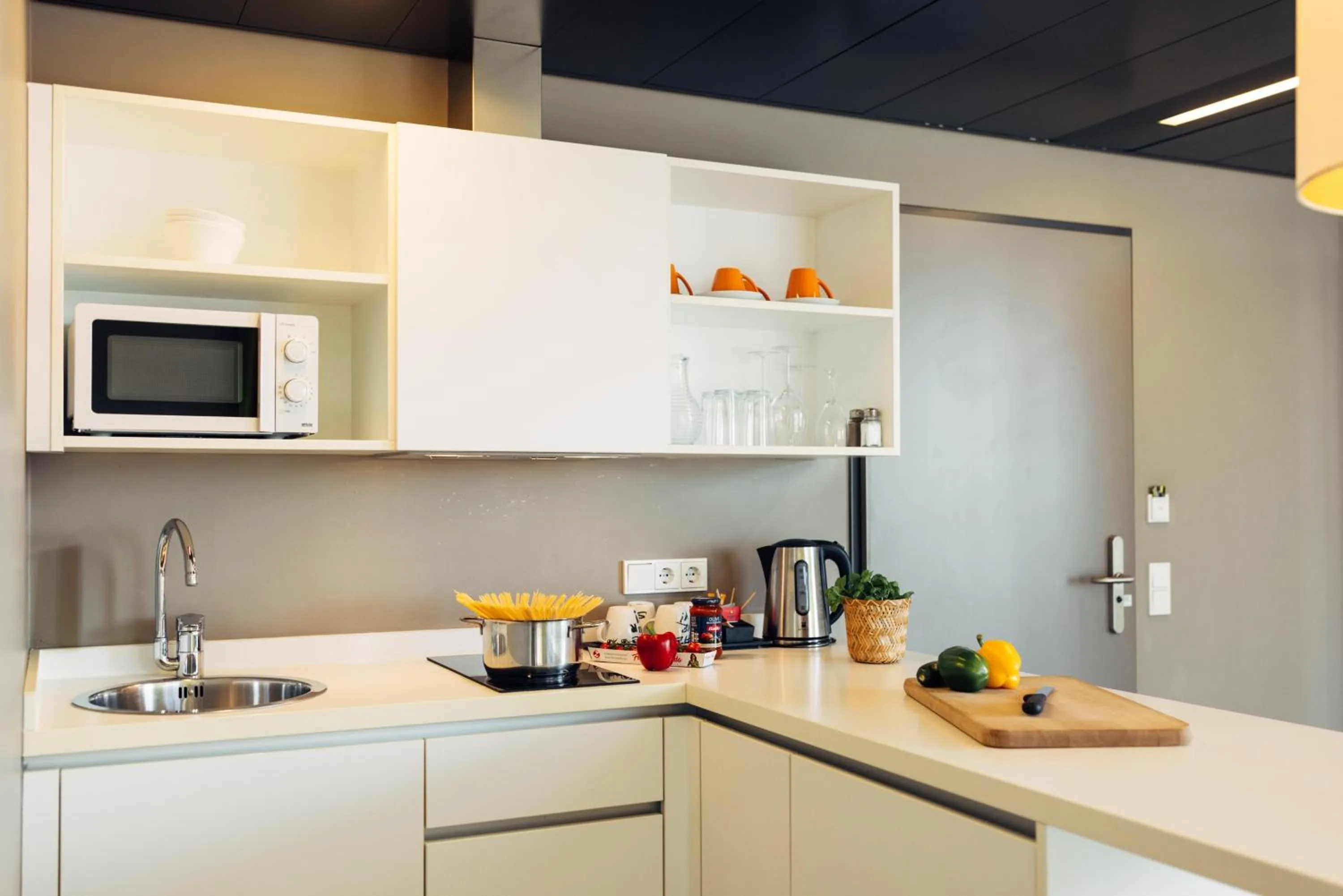 Photo of the whole room in harry's home Hart bei Graz hotel & apartments