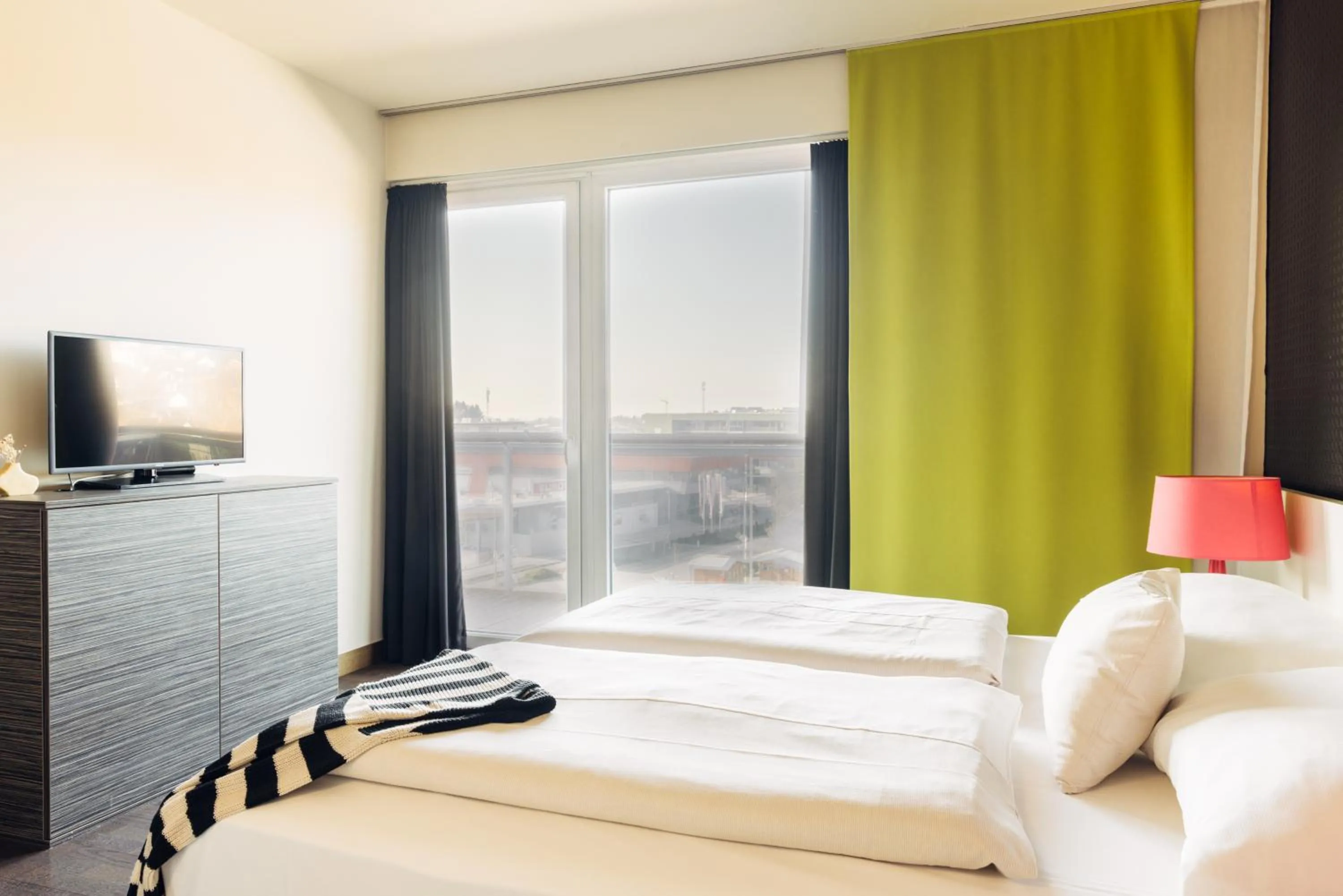 Bed in harry's home Hart bei Graz hotel & apartments