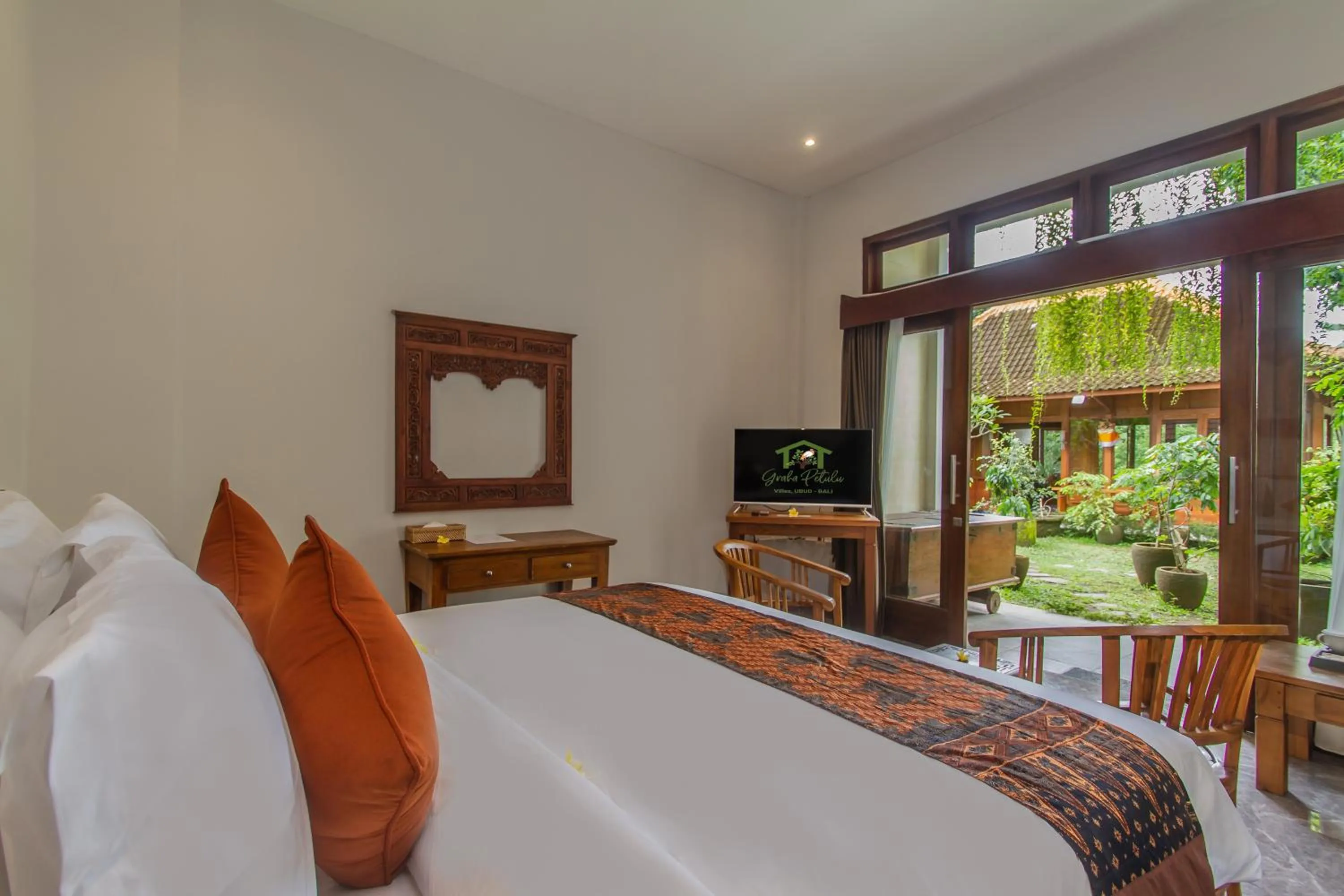 Bed in Graha Petulu Ubud by GenuineHost