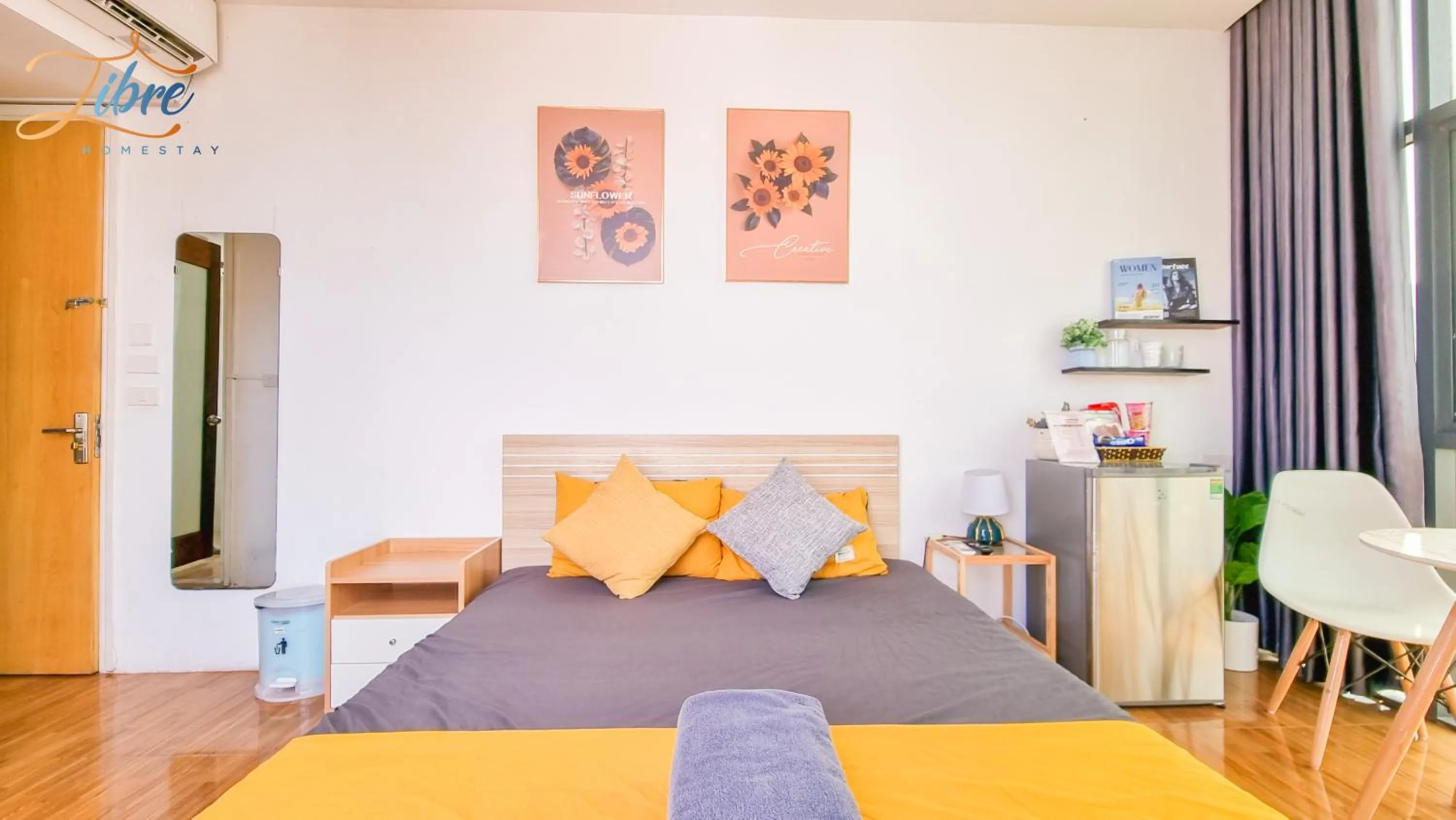 Living room, Bed in Libré Homestay