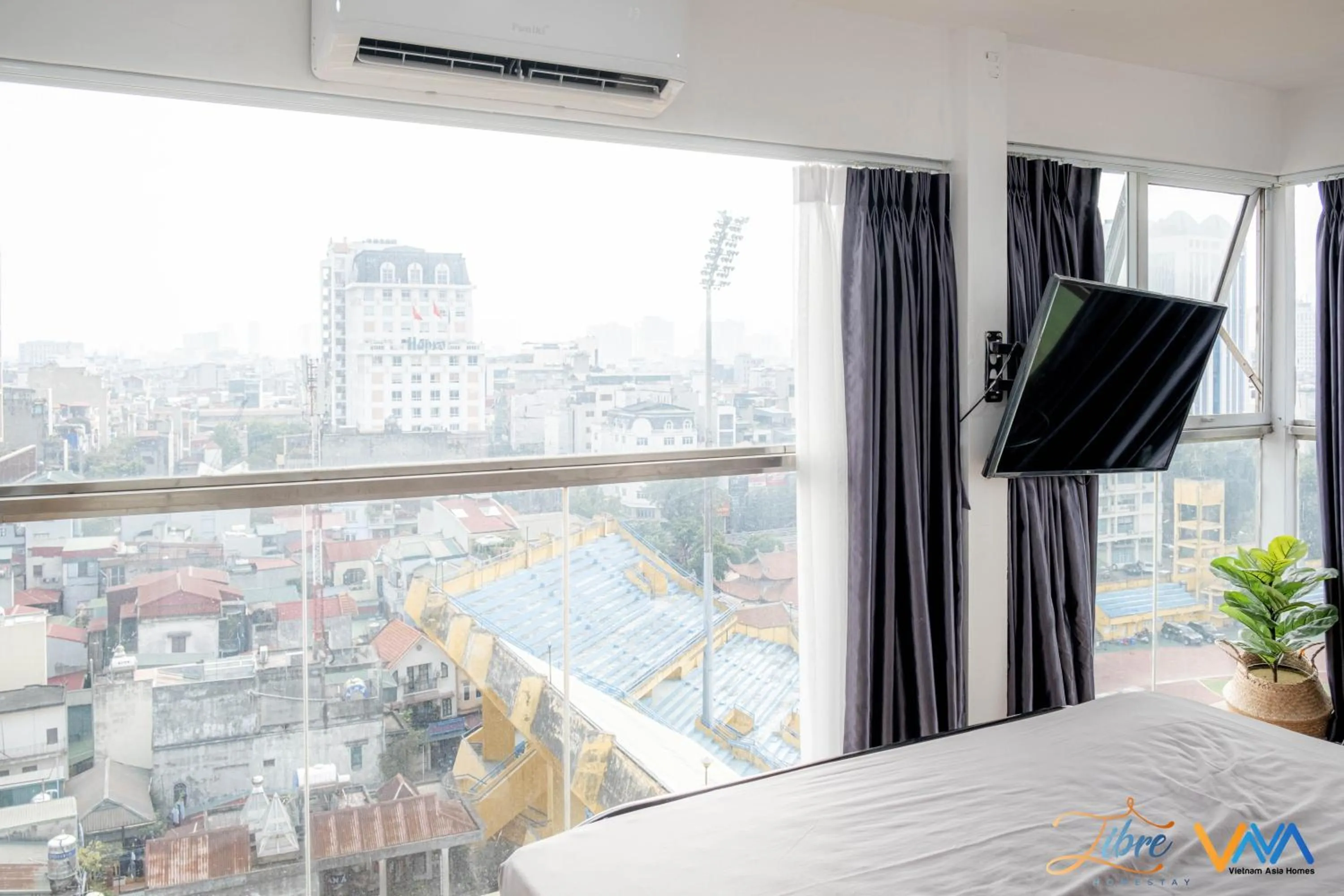 Communal lounge/ TV room in Libré Homestay