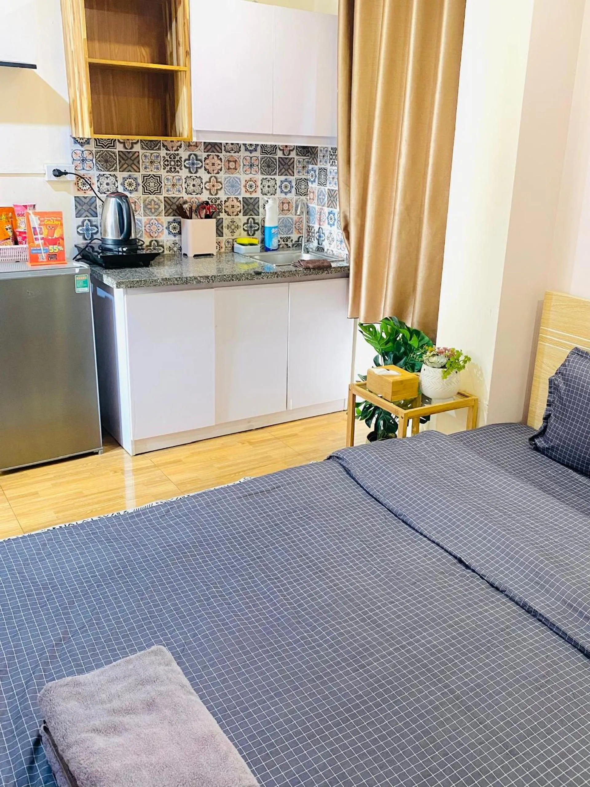 stove, Bed in Libré Homestay