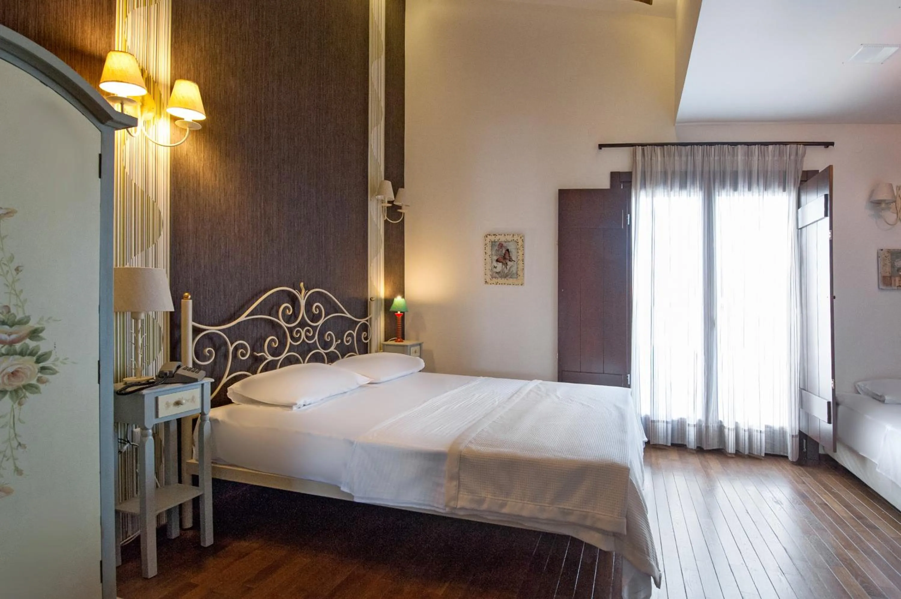 Bed in Polys Guest House