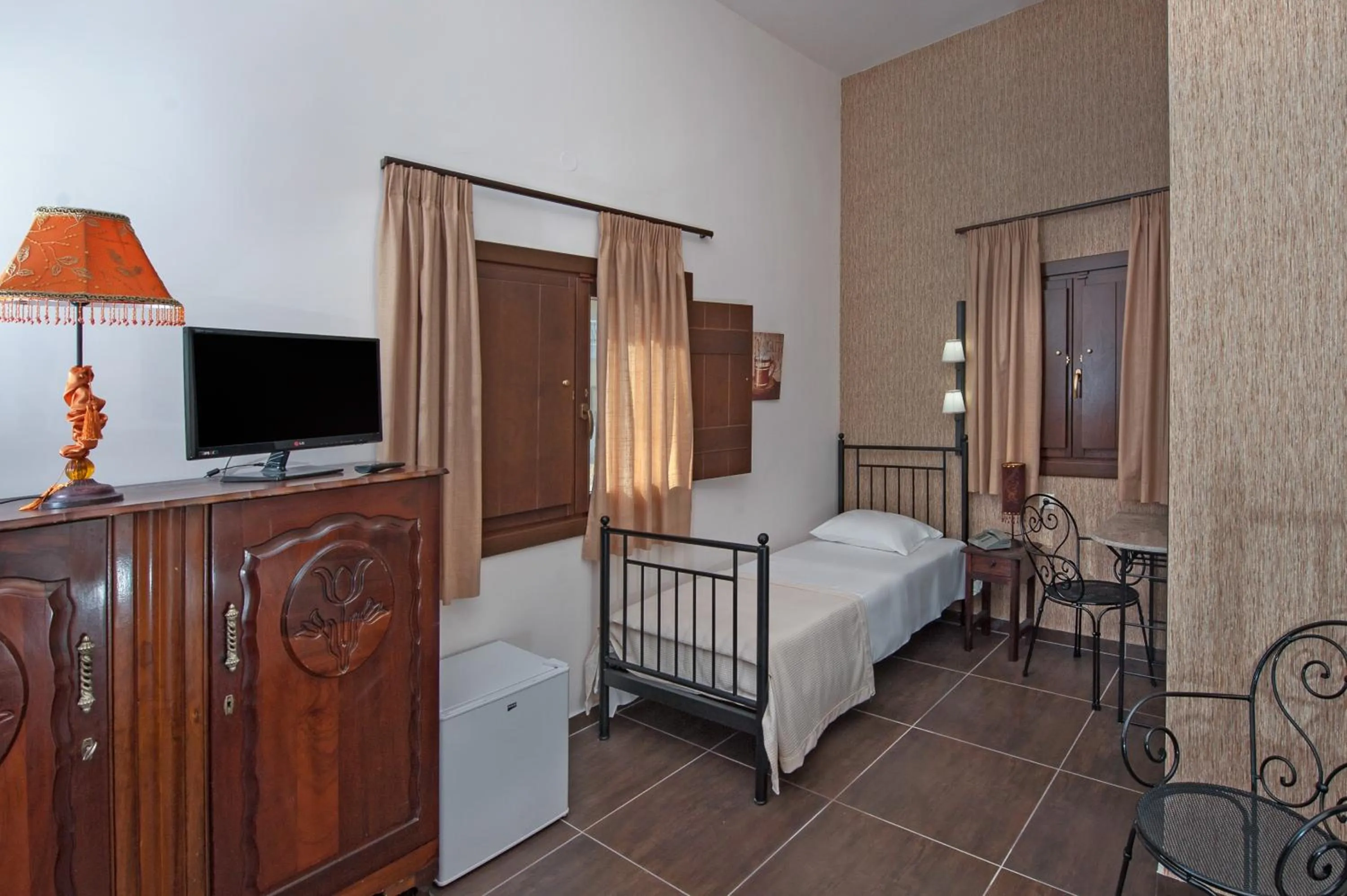 Bed in Polys Guest House