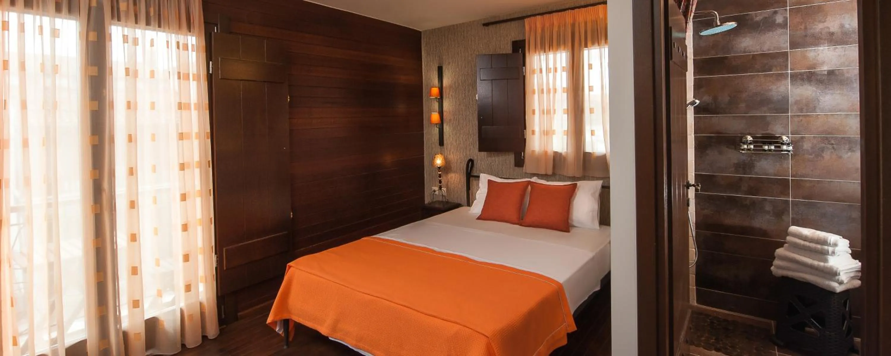 Bed in Polys Guest House