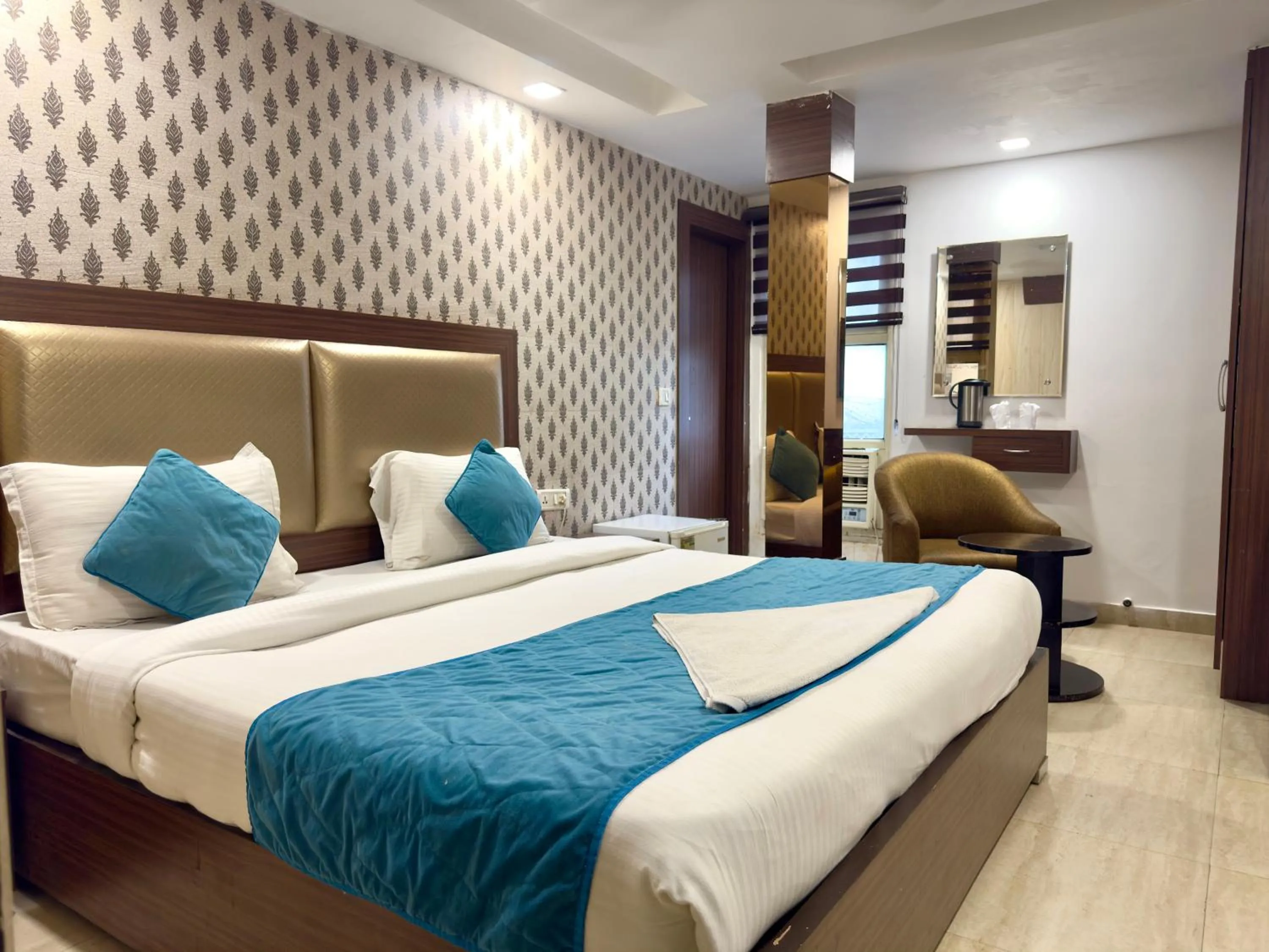 Bedroom, Bed in Hotel Pawan Plaza - Near BLK and Ganga Ram Hospital - Karol Bagh