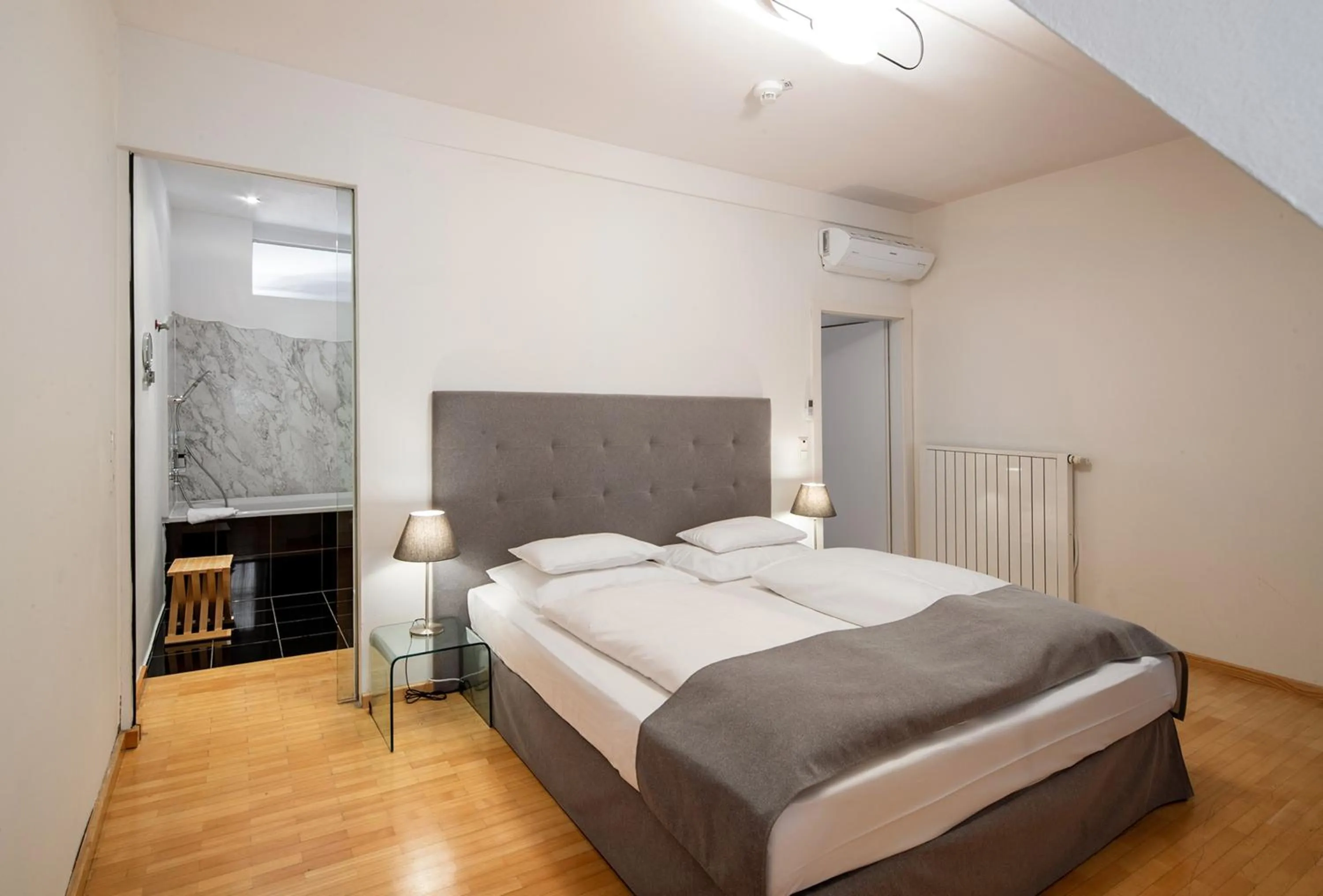 Bed in Boutique Hotel Dom - Rooms & Suites