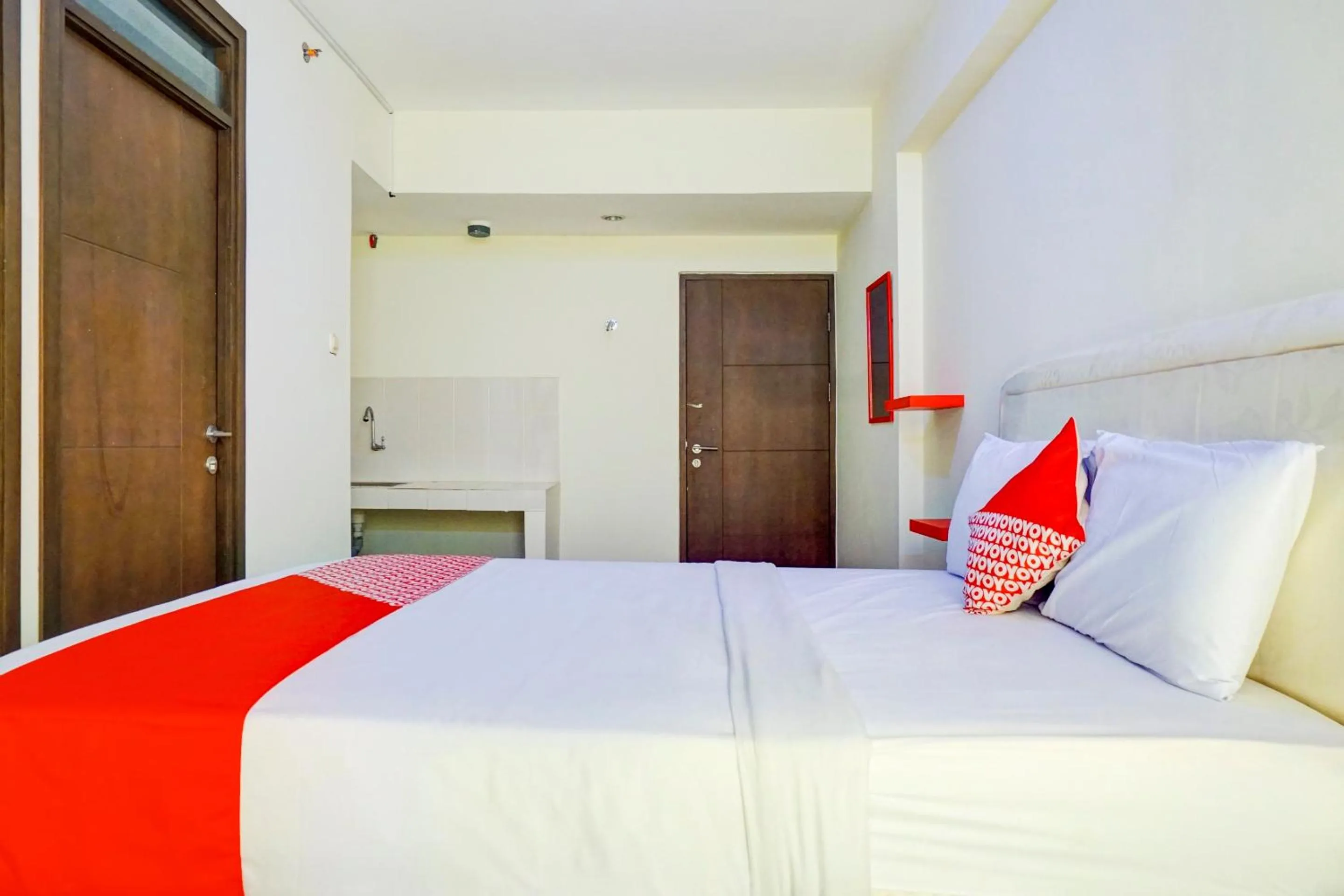 Bedroom in OYO 90230 Skyland Bogor Valley