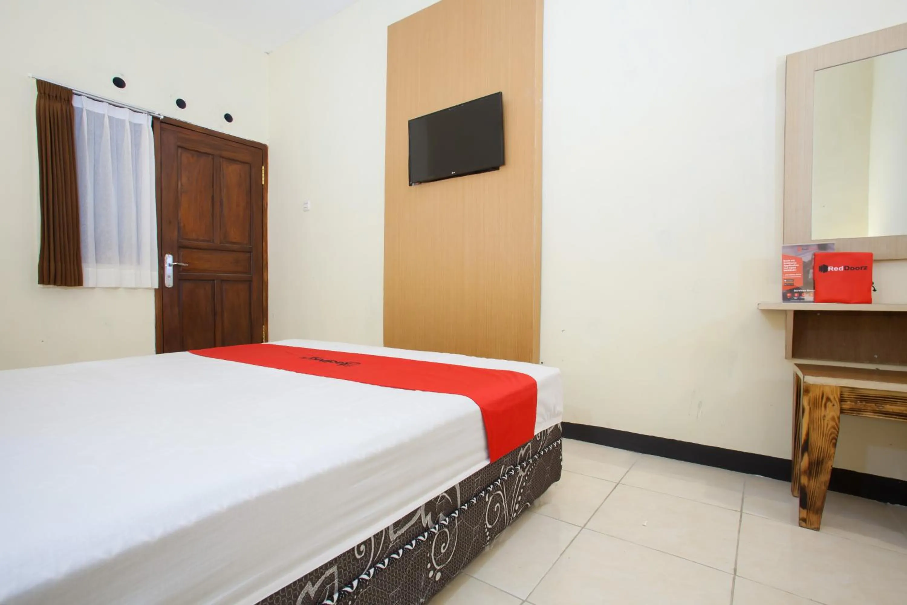 Bed in RedDoorz At Pandan Inn Batu