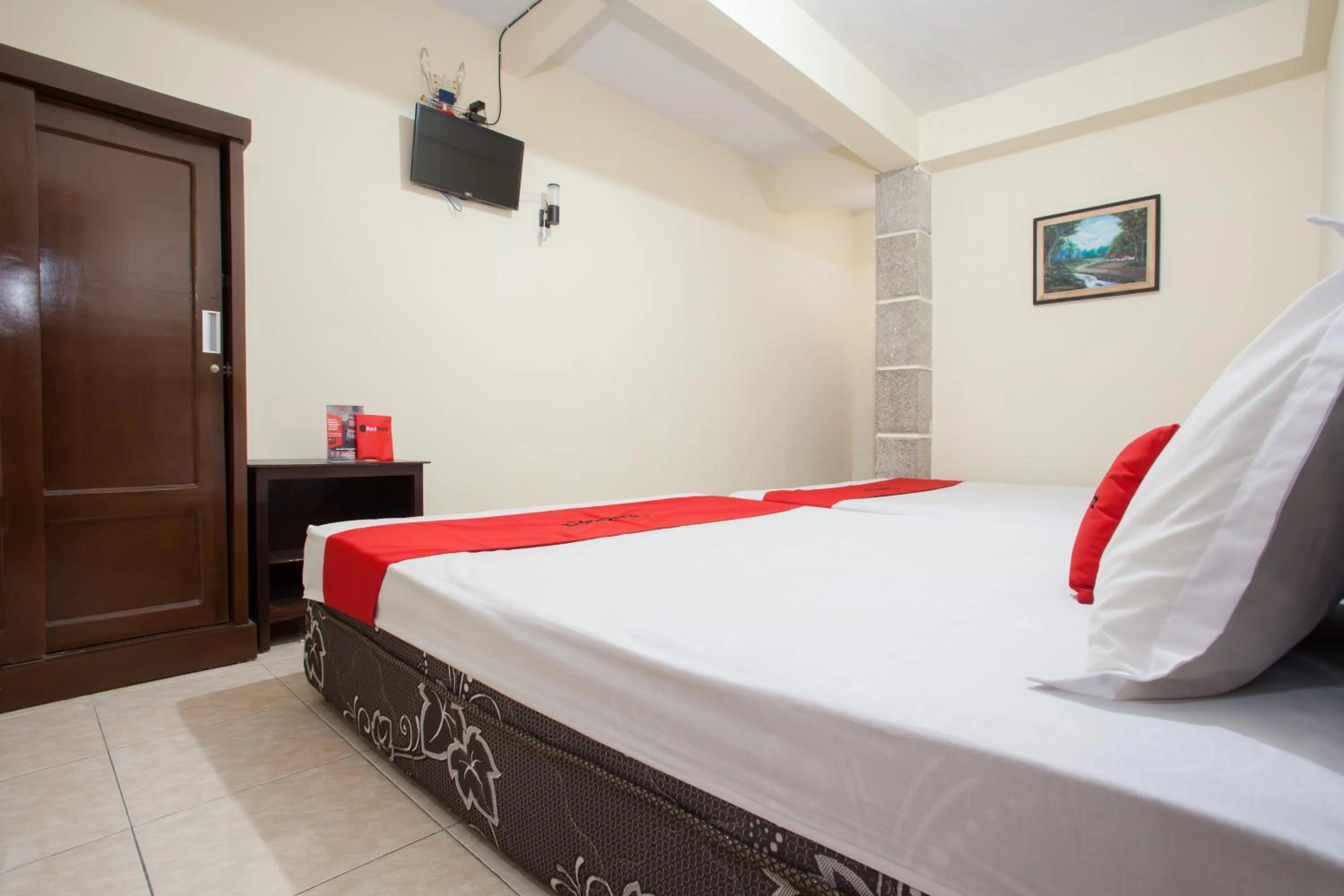 Bed in RedDoorz At Pandan Inn Batu