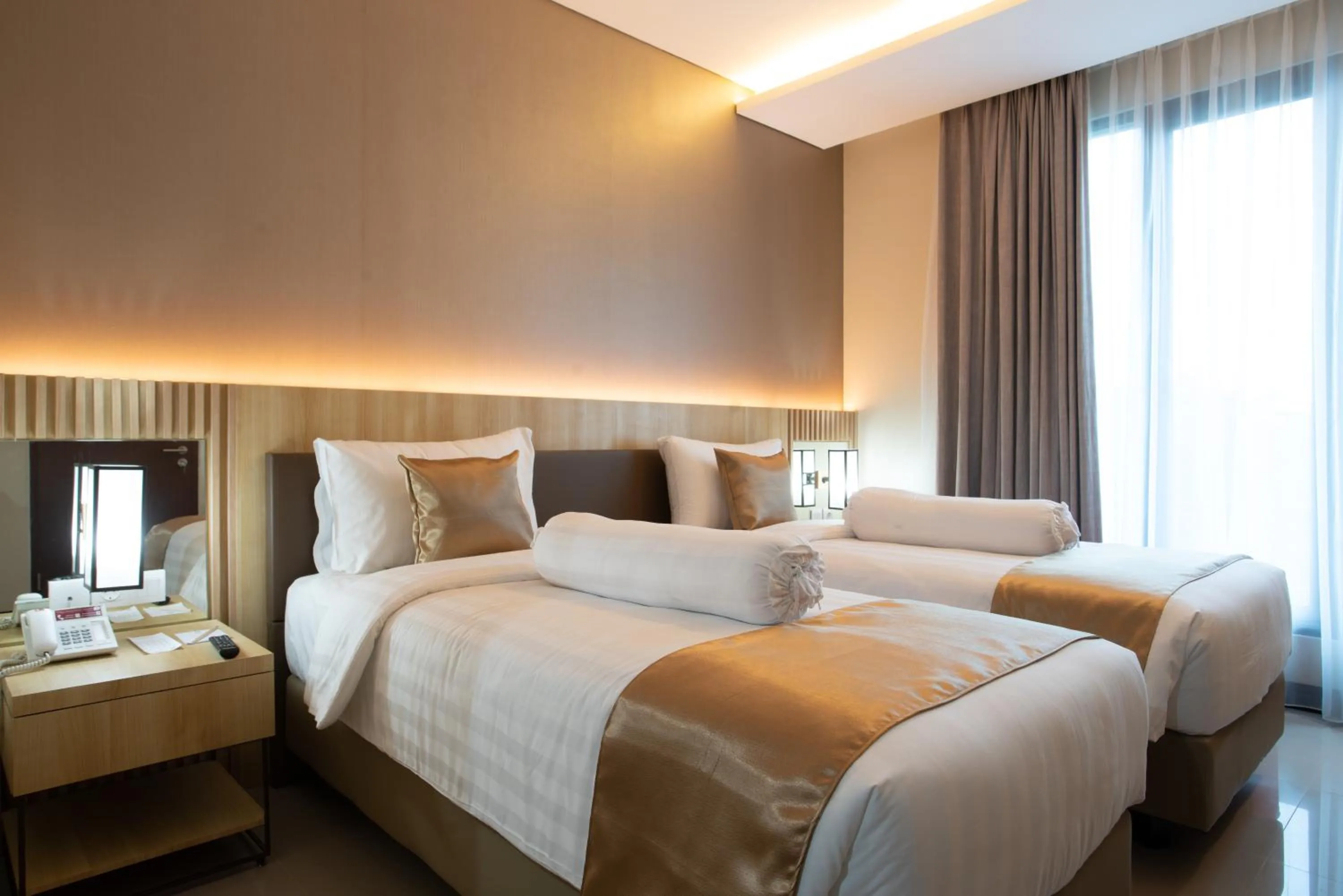 Bed in Braling Grand Hotel Purbalingga, Azana Hotels Collection