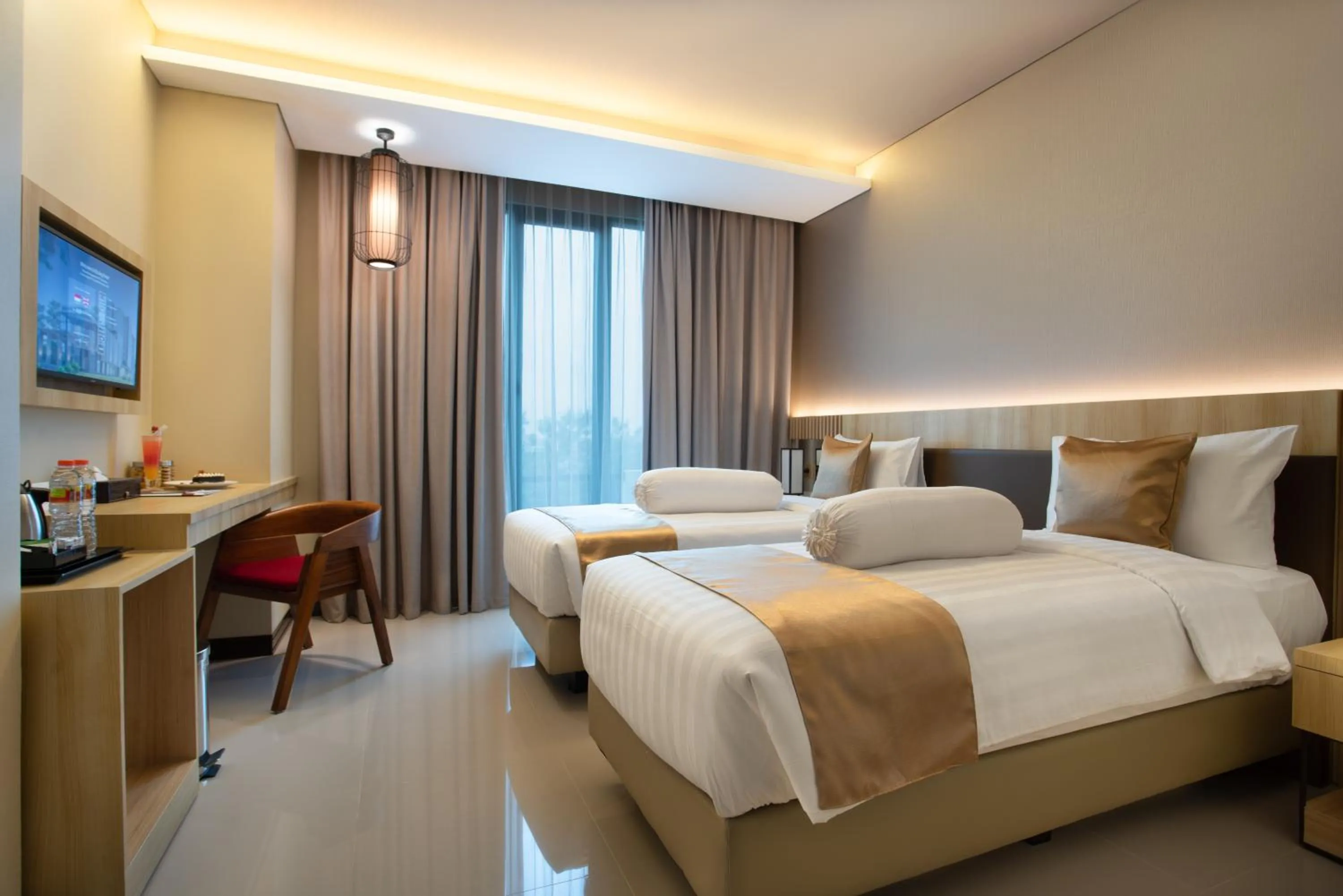 Bed in Braling Grand Hotel Purbalingga, Azana Hotels Collection