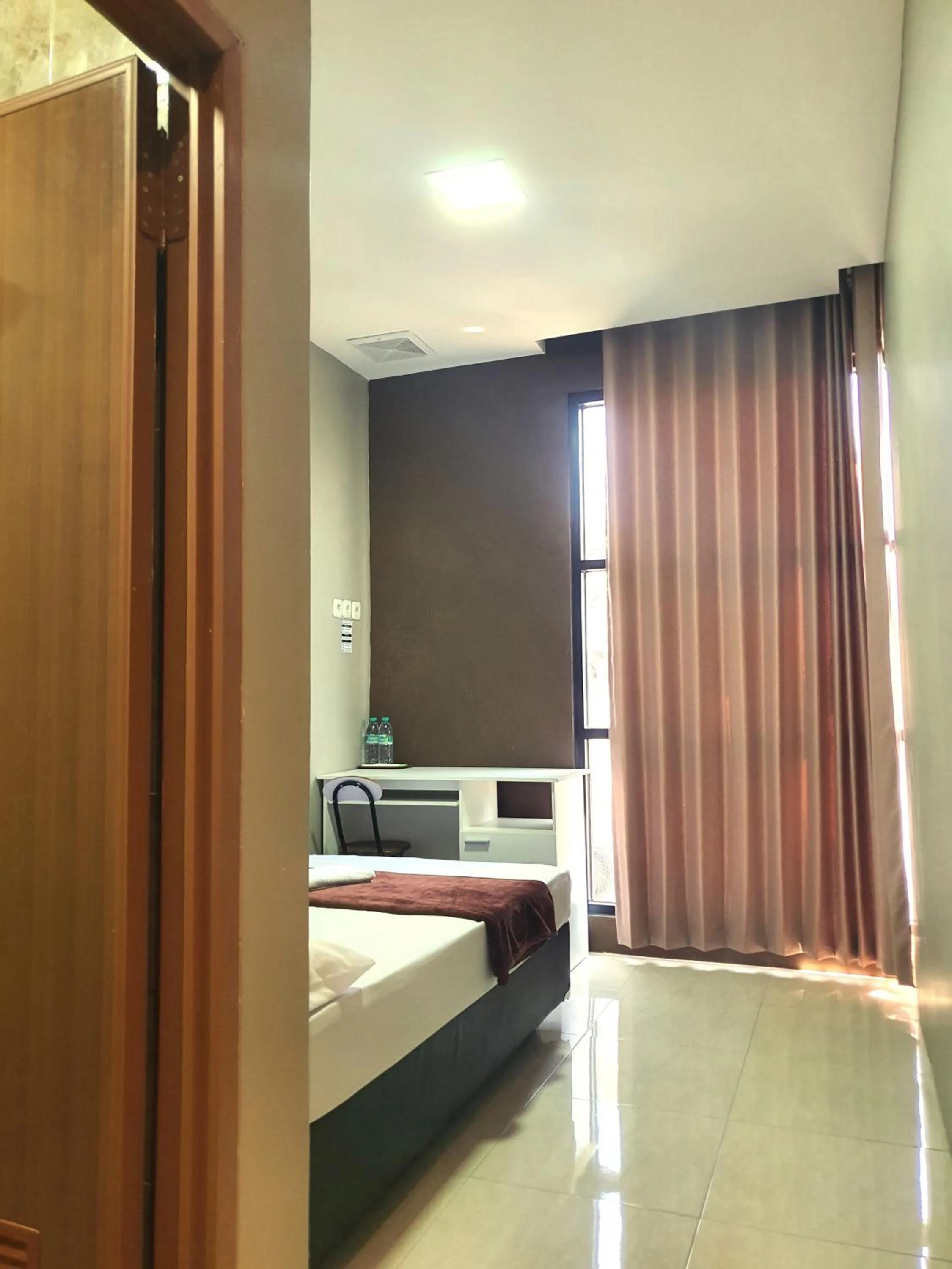 Bed in EDUTAMA Homestay Syariah