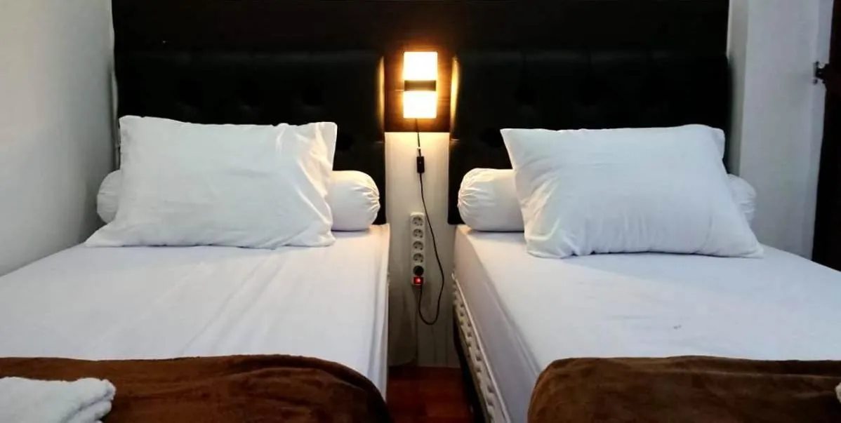 Bed in EDUTAMA Homestay Syariah