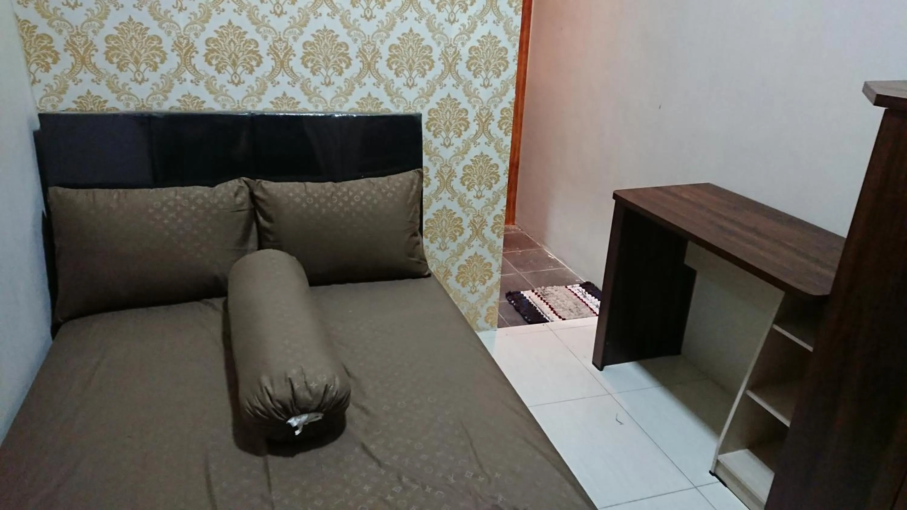 Bed in EDUTAMA Homestay Syariah