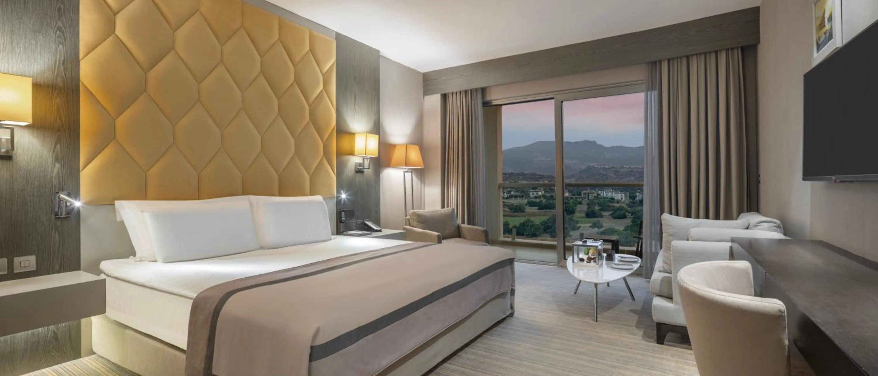 Bed in Elexus Hotel Resort & Spa & Casino