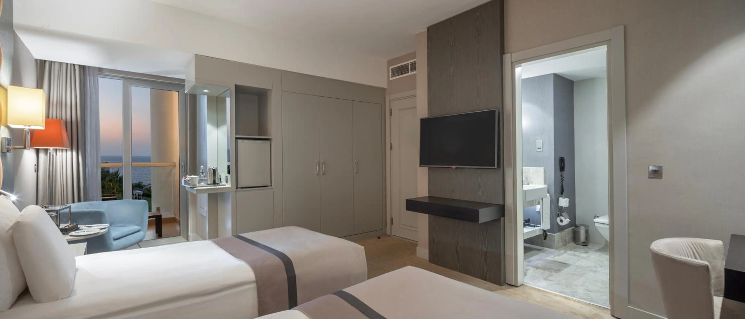 Bed in Elexus Hotel Resort & Spa & Casino