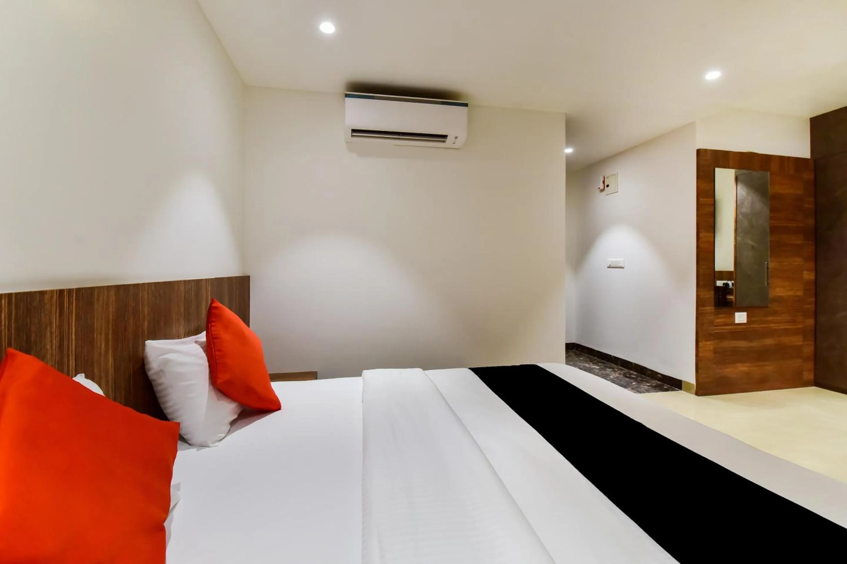 Bedroom in Capital O Maurya Inn