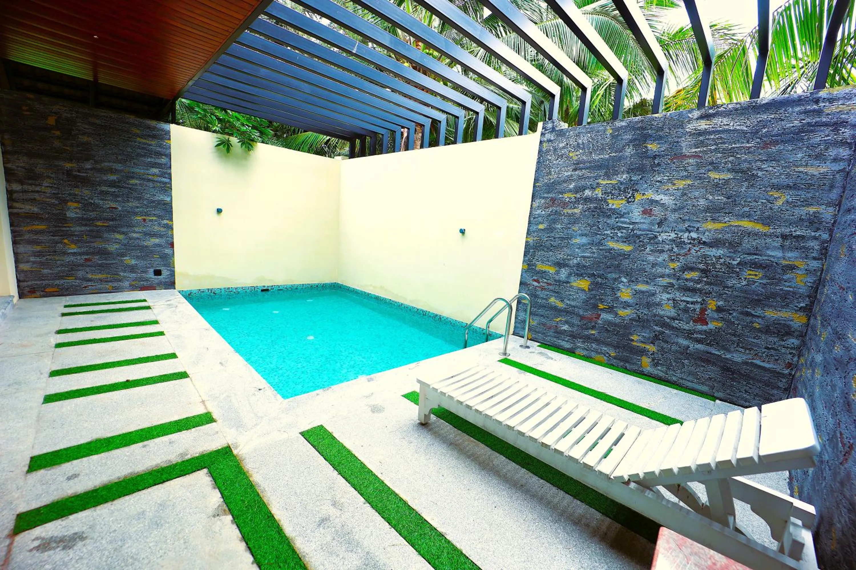 Swimming pool in coral beach resort