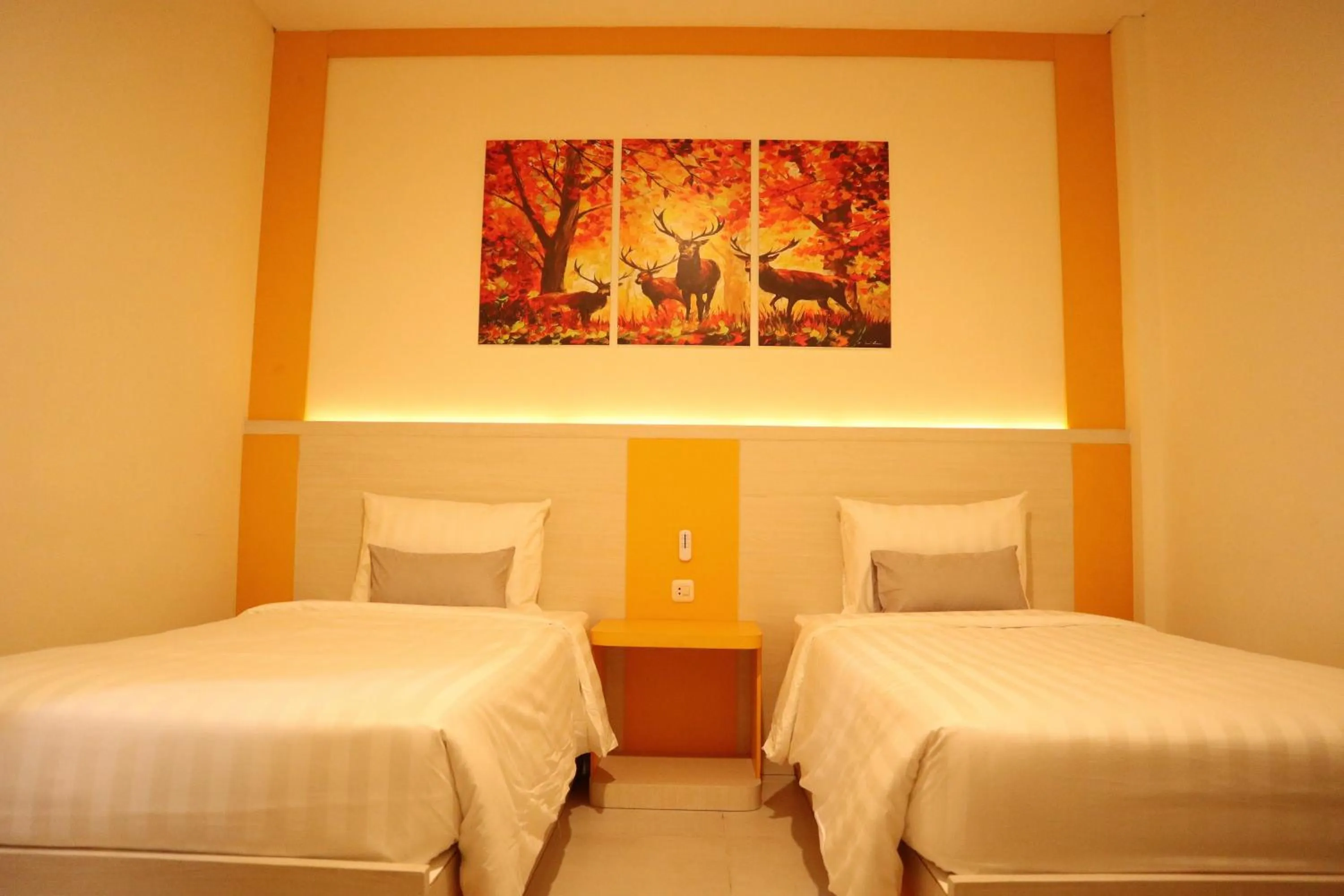 Bed in D'Carol Hotel