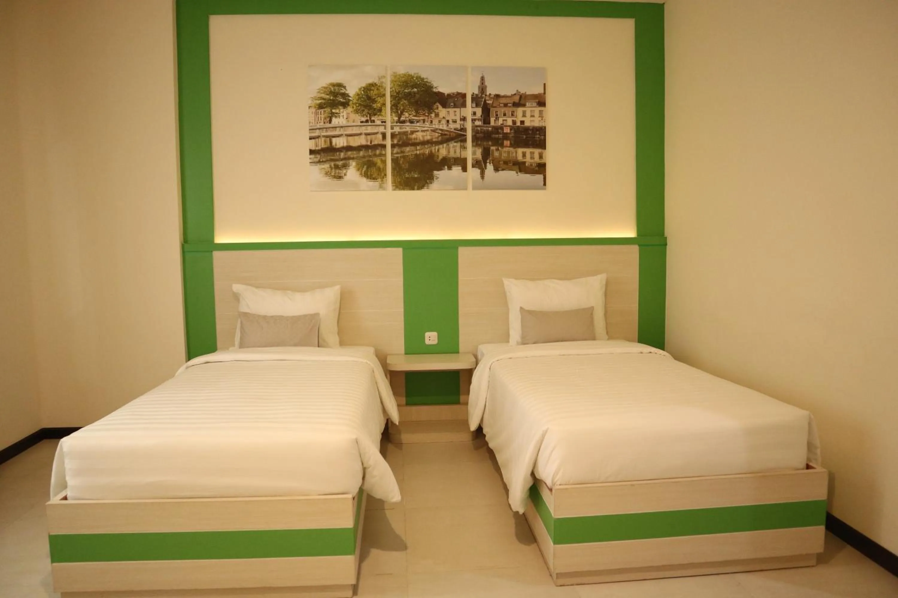 Bed in D'Carol Hotel