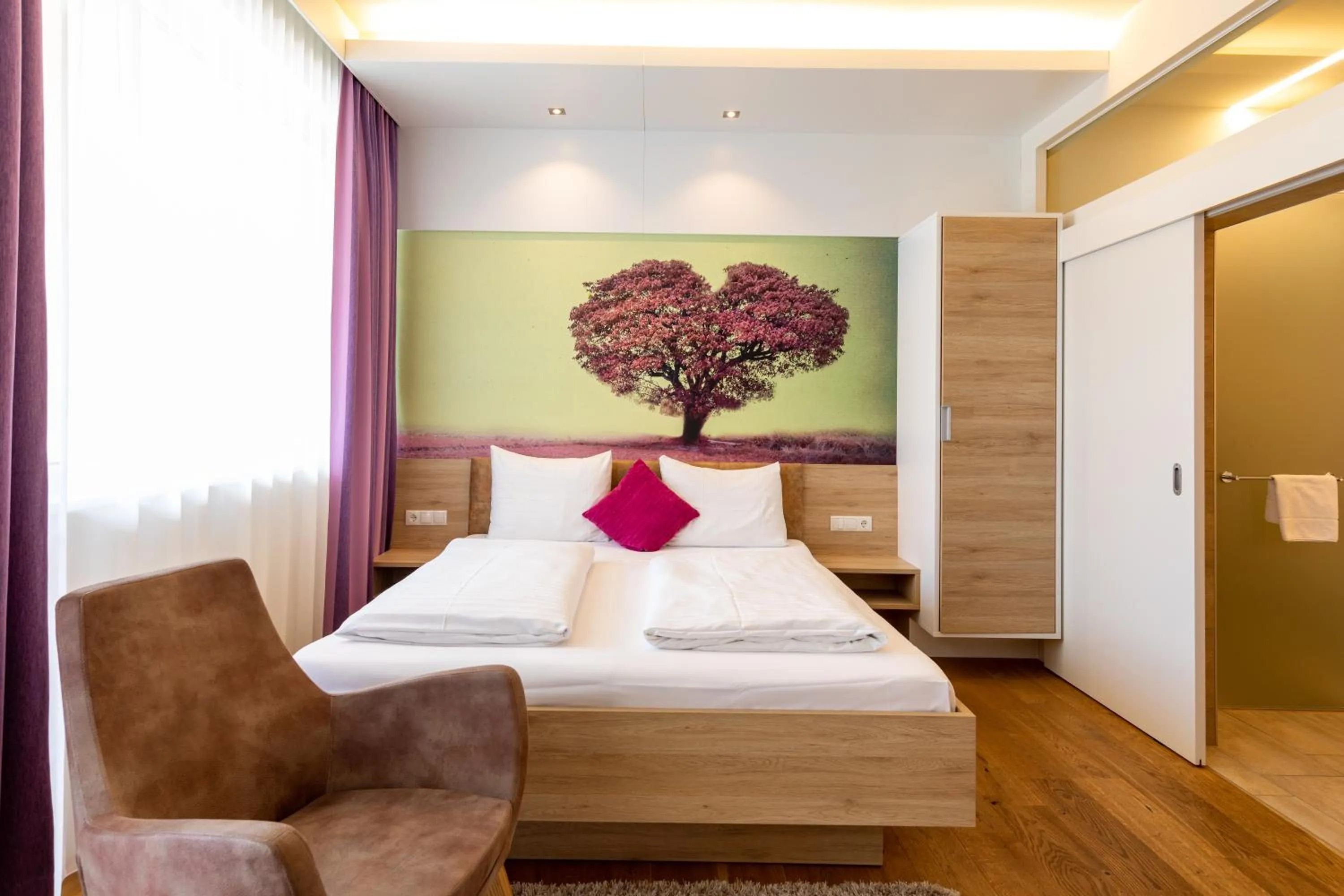 Photo of the whole room, Bed in Hotel Süd Graz