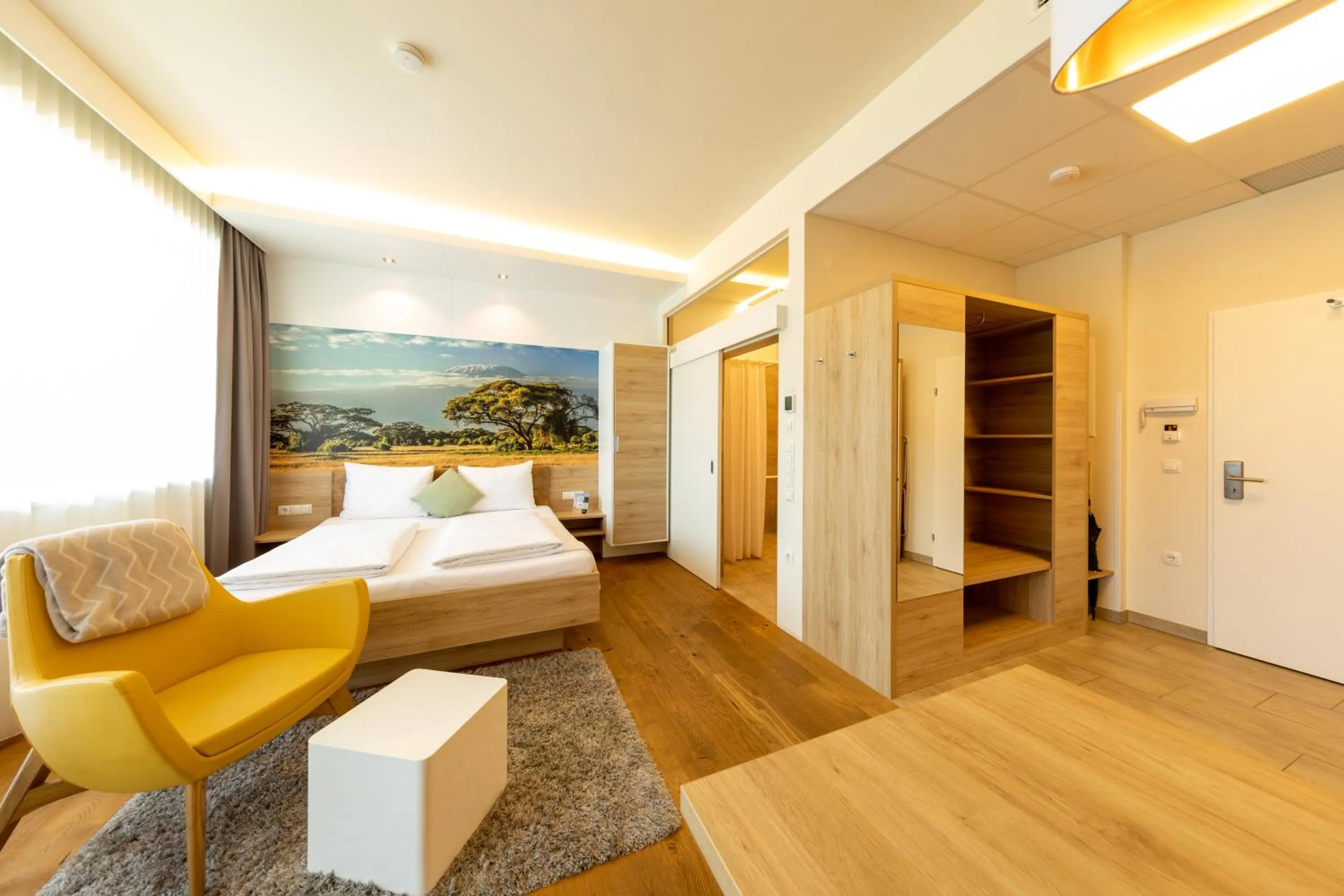 Seating area, Bed in Hotel Süd Graz