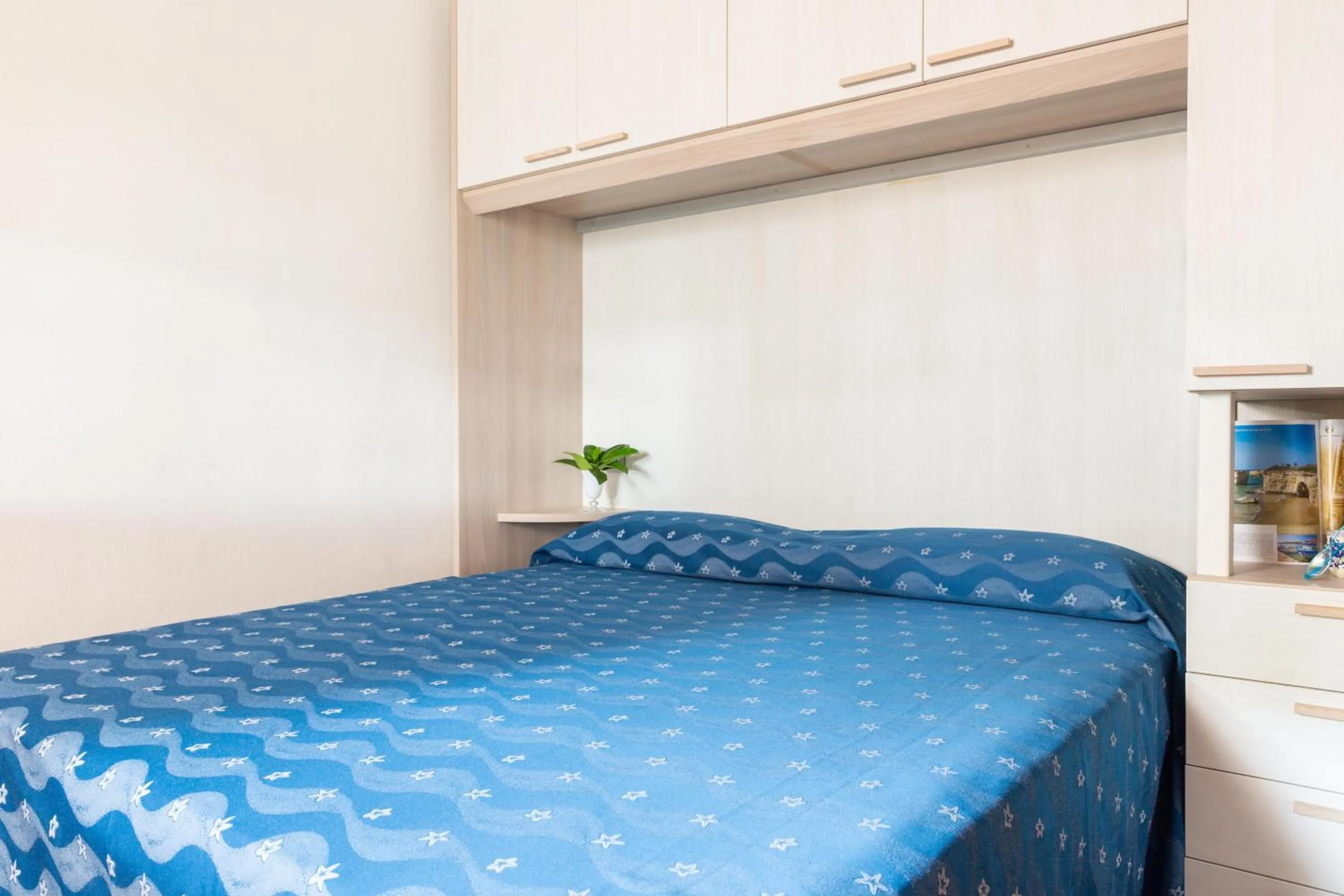 Photo of the whole room, Bed in Gitavillage Argentario