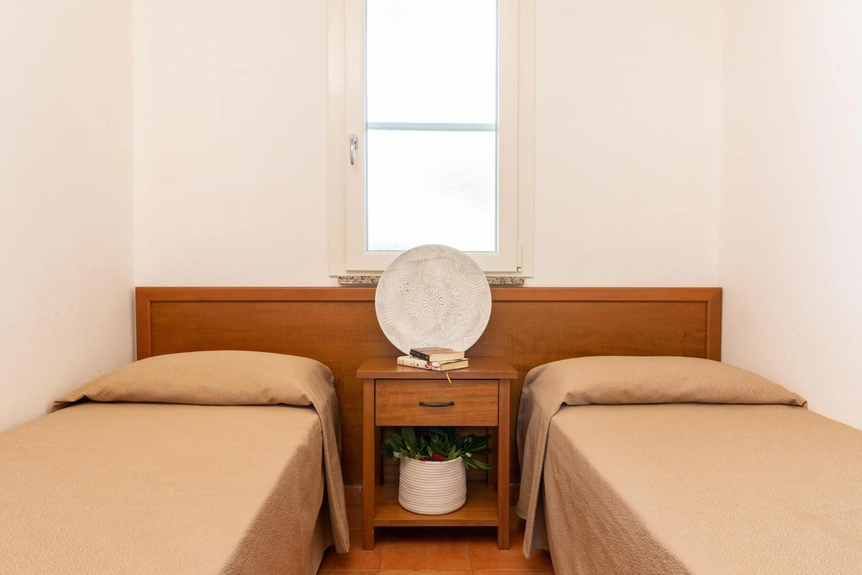 Photo of the whole room, Bed in Gitavillage Argentario