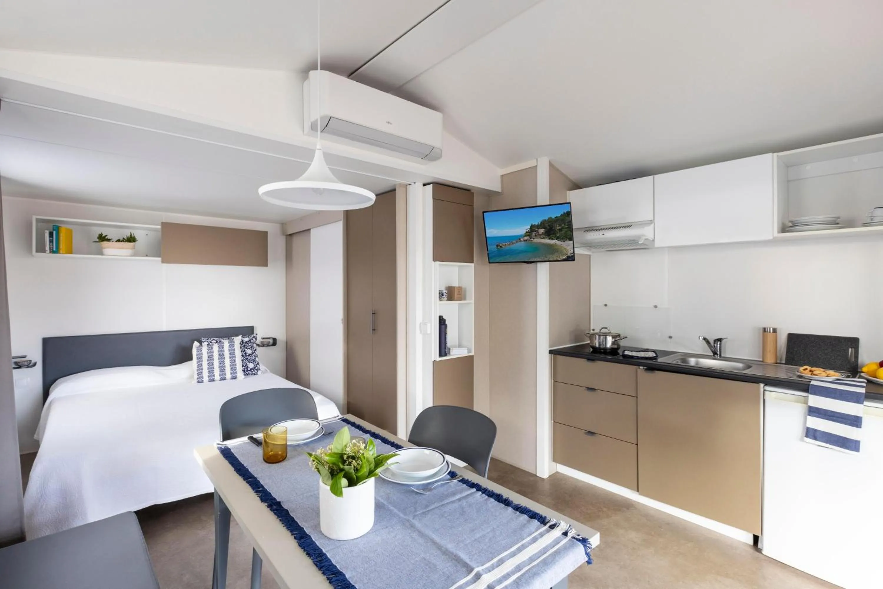 Photo of the whole room, Bed in Gitavillage Argentario