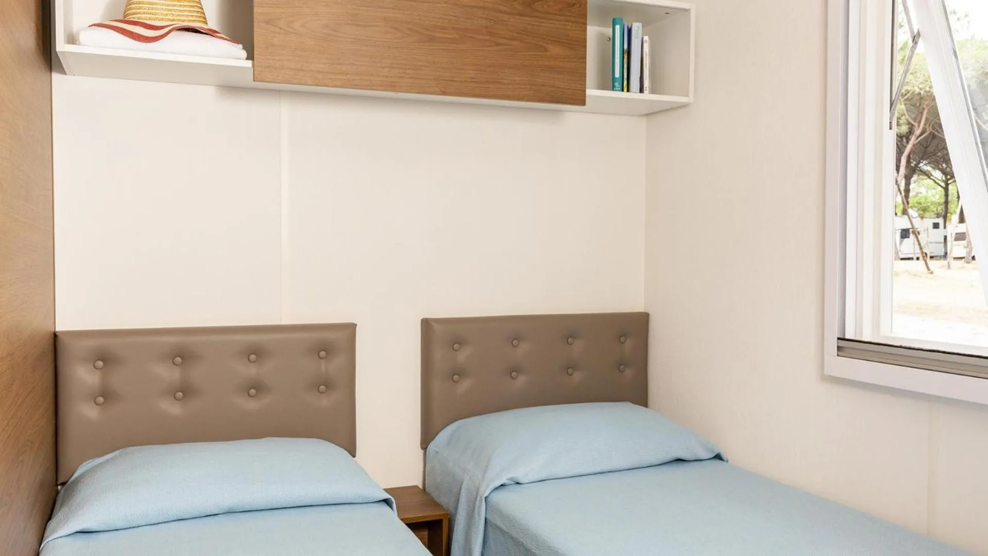 Photo of the whole room, Bed in Gitavillage Argentario