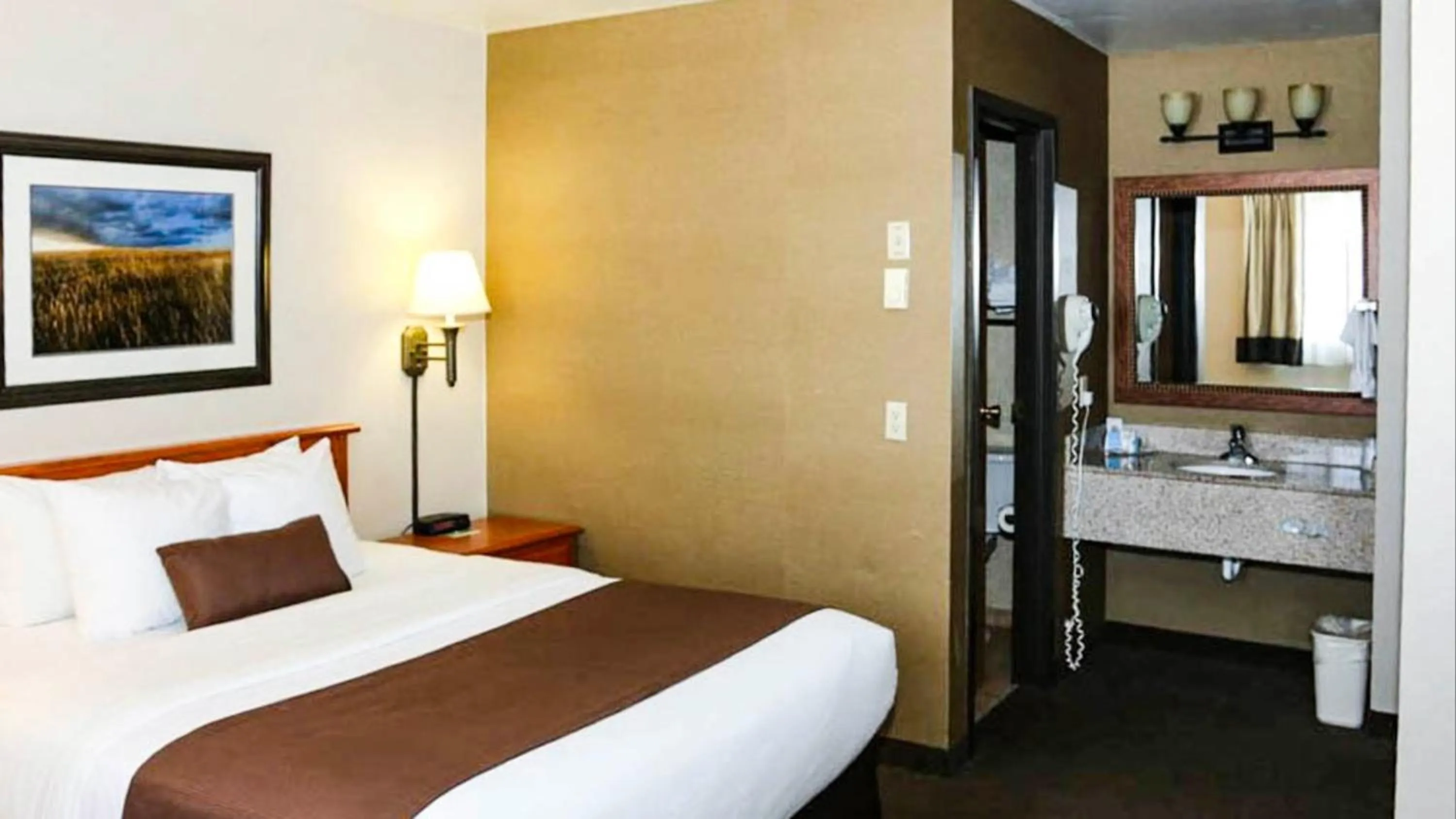 Bedroom, Bed in Studio 6 - Minot, ND