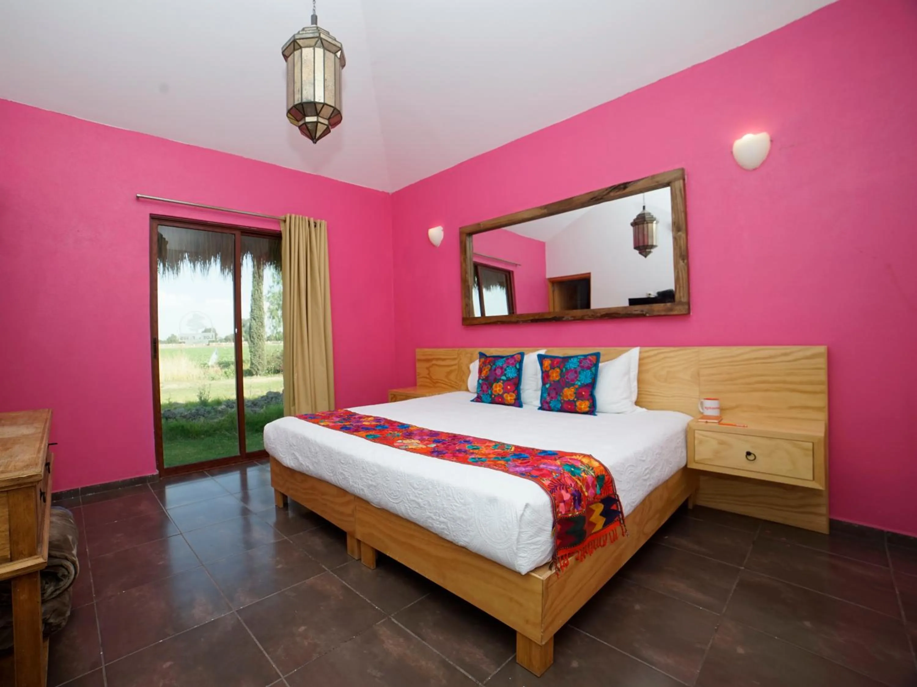 Bedroom in Hotel y Villas Los Pirules by Rotamundos