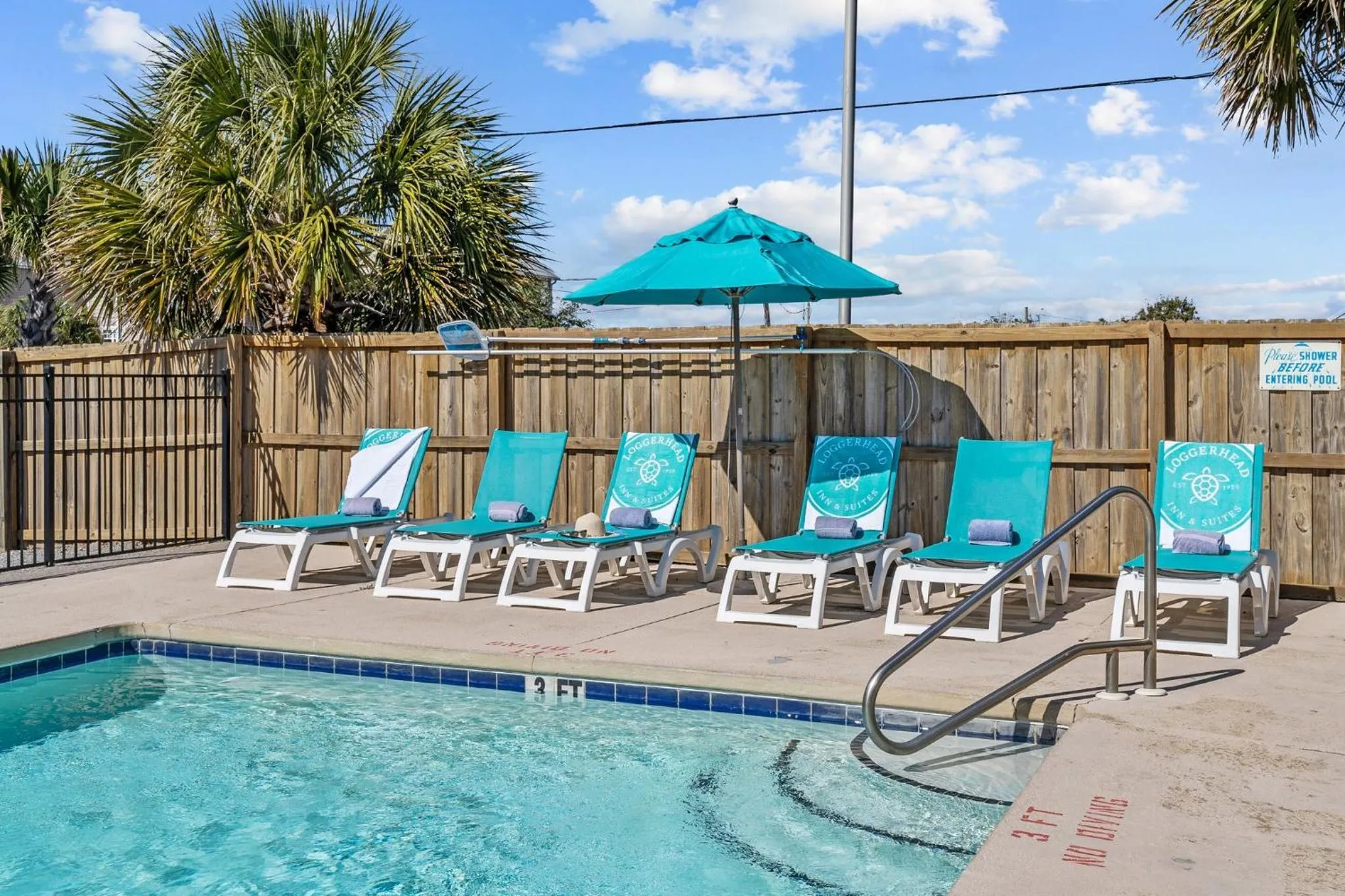 Swimming pool in Loggerhead Inn and Suites