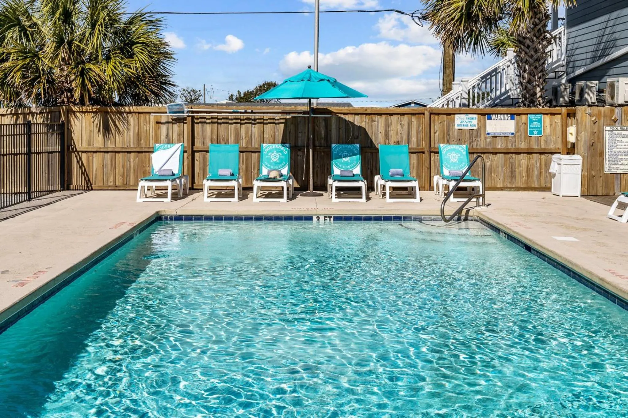 Swimming pool in Loggerhead Inn and Suites