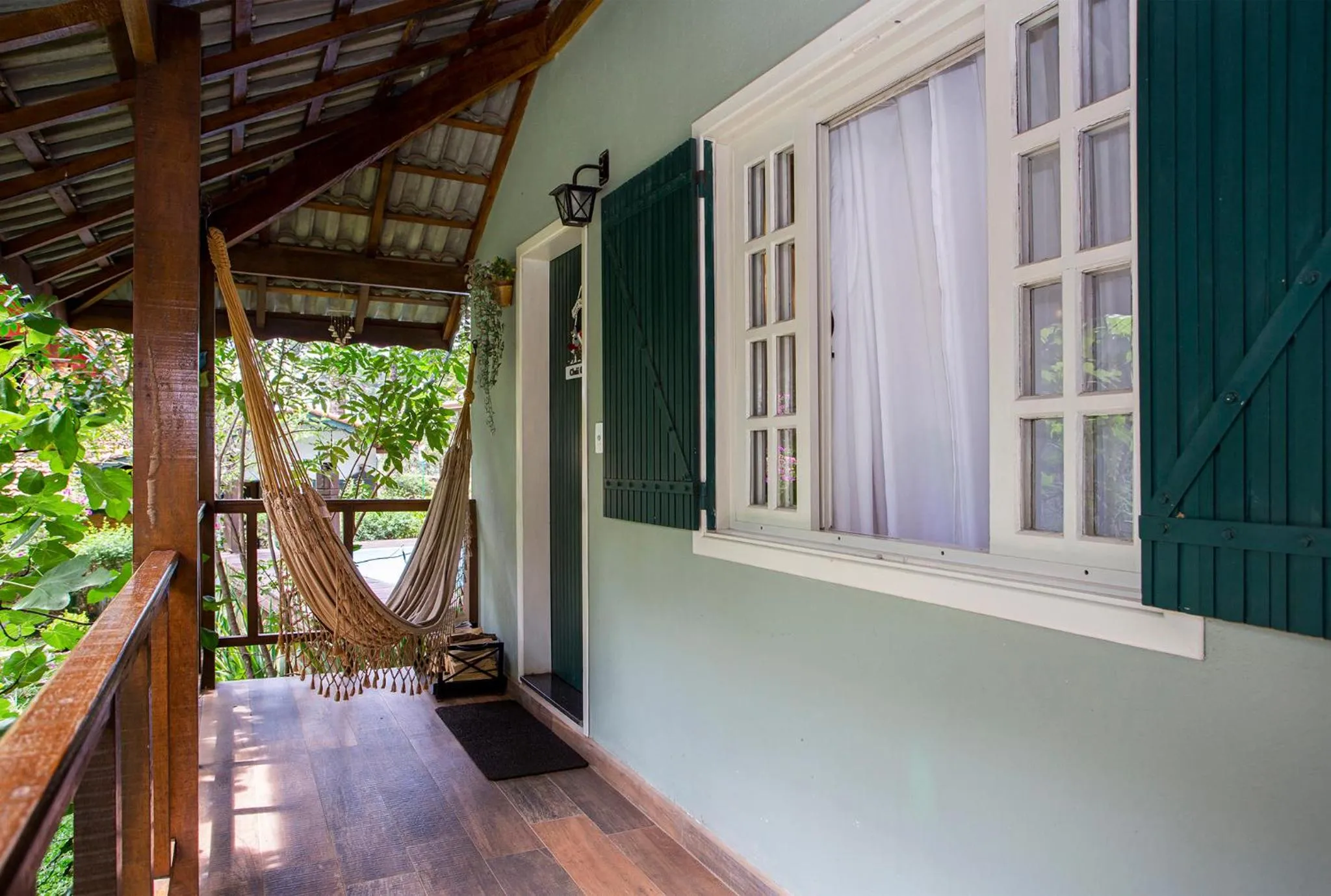 Balcony/Terrace in Pousada Suiça Mineira Garden