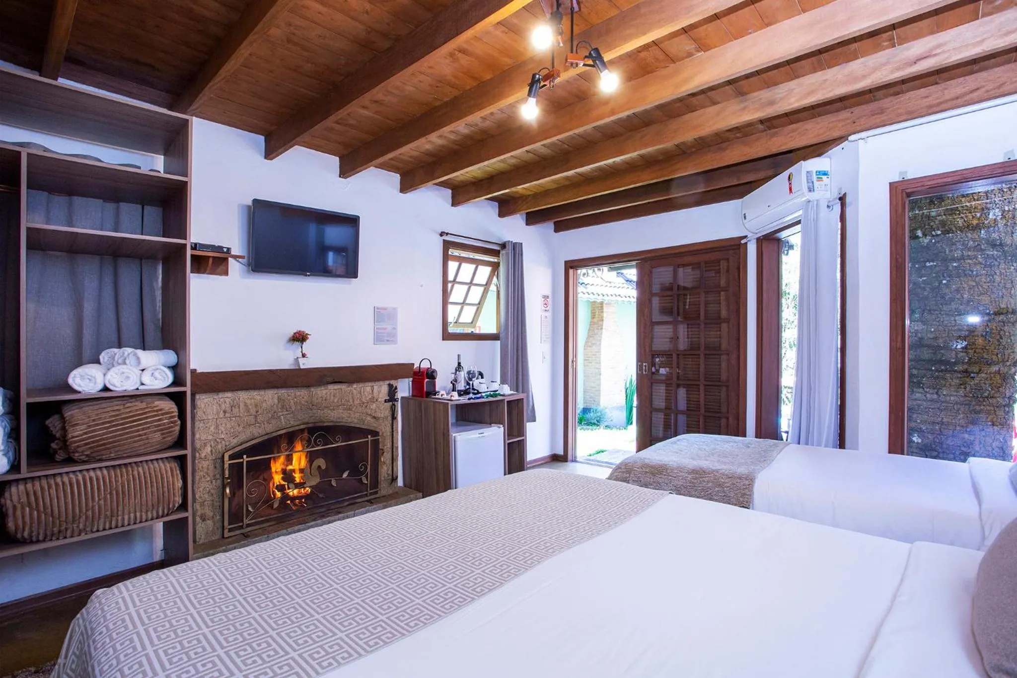 Bed in Pousada Suiça Mineira Garden